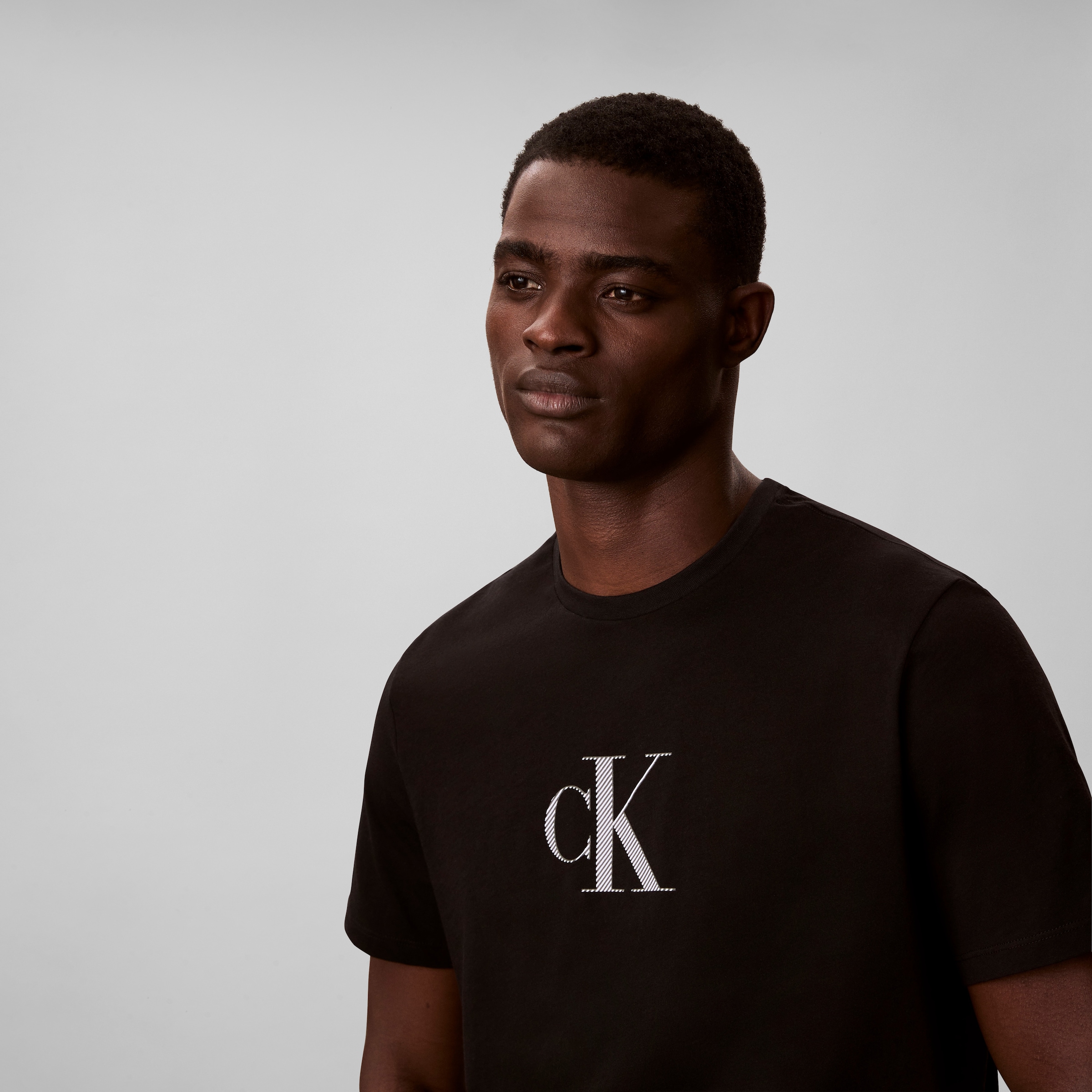 Calvin Klein T-Shirt »SS 30S DISTRESS MONOGRAM GRAPHIC« Regular fit mit Logodruck
