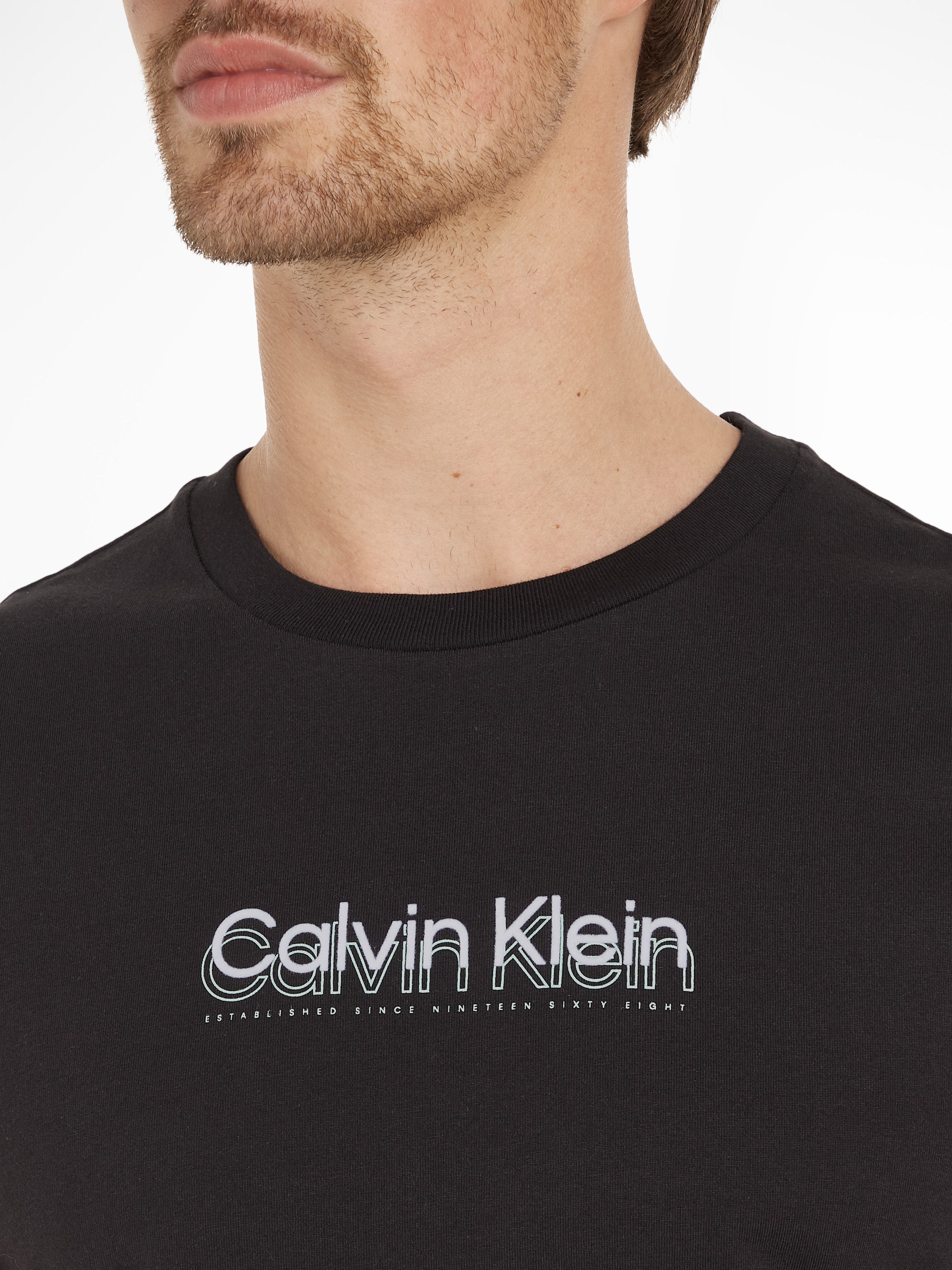 Calvin Klein T-Shirt »FLOCK LOGO T-SHIRT«, mit Logoschriftzug