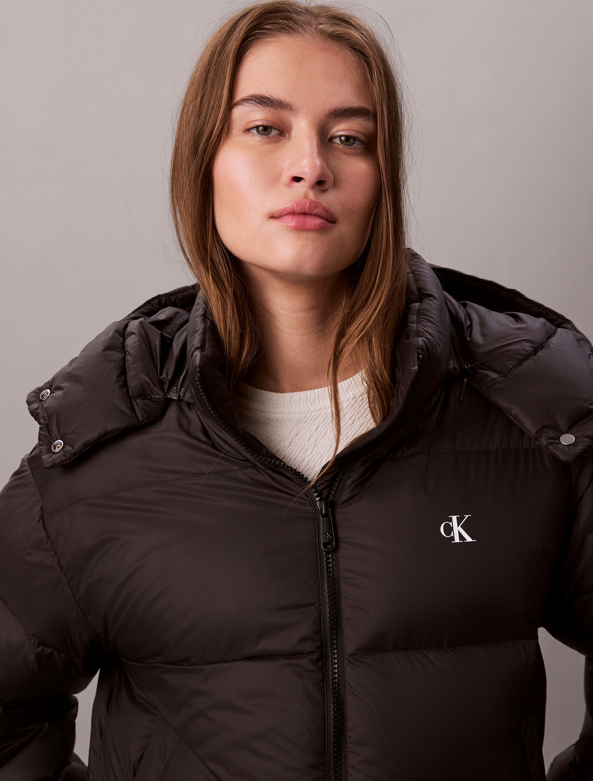 Calvin Klein Jeans Steppjacke »ESSENTIAL MIDWEIGHT PUFFER JACKE«, mit Kapuze, Mit Rundhalsausschnitt, regular fit