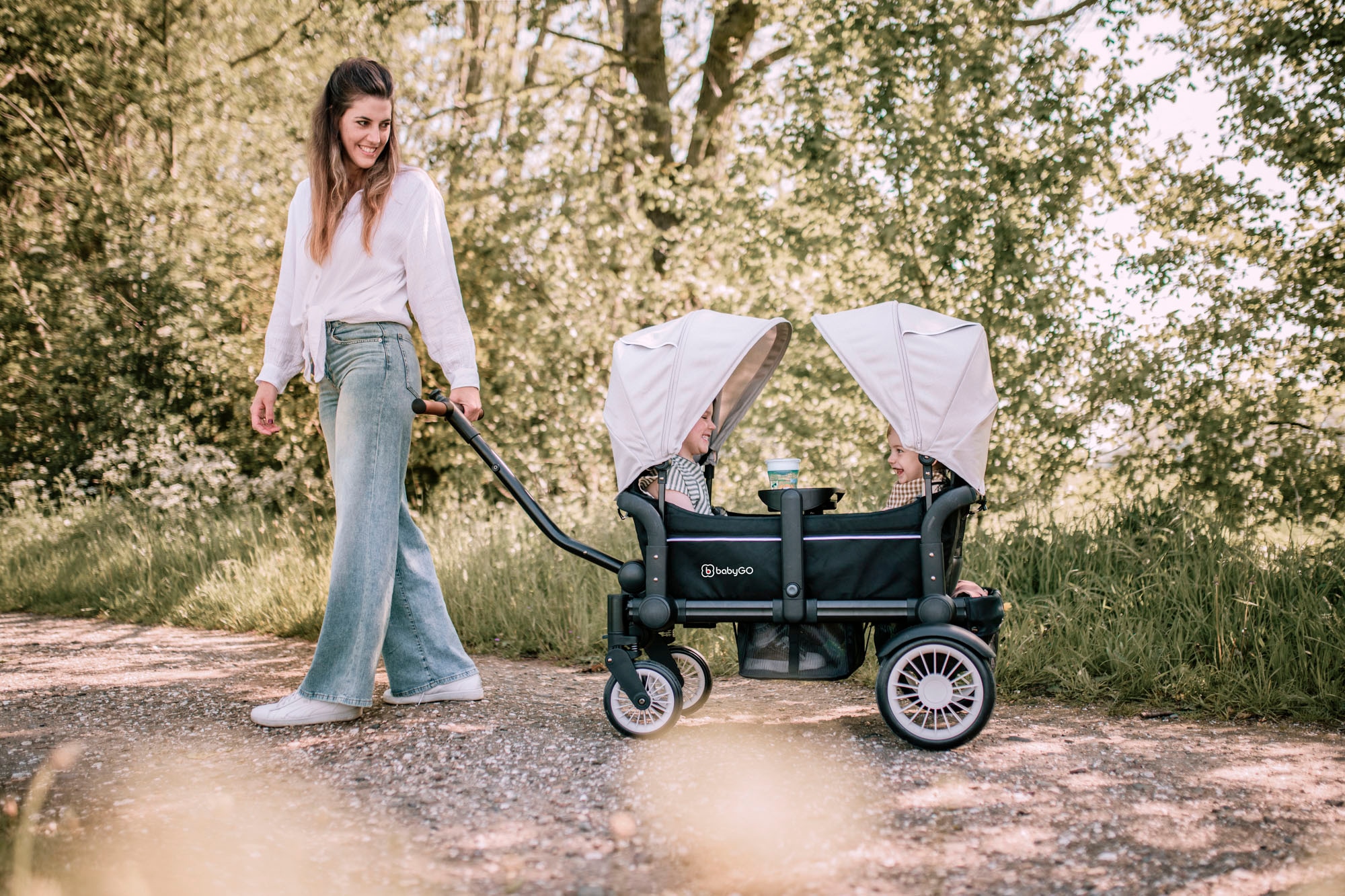 BabyGo Bollerwagen »Cozy Rider«, (Set, 7 tlg., inkl. 2x Sonnenschutz, Tisch, Moskito- u. Regenschutz, Flaschenhalter), klein zusammenfaltbar