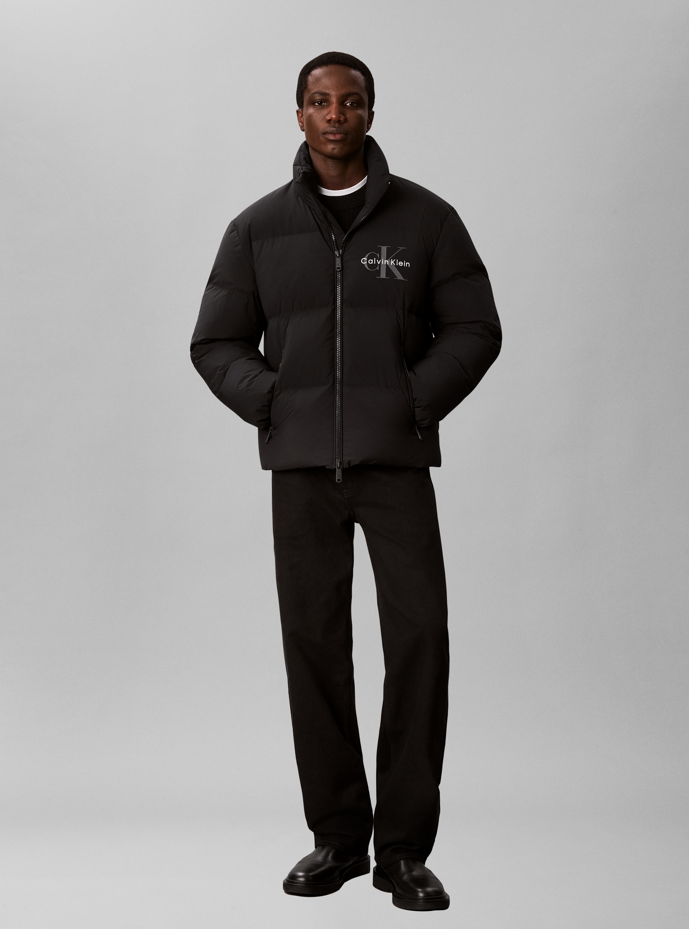 Calvin Klein Jeans Steppjacke »NYLON MONOLOGO DOWN PUFFER« ohne Kapuze Regular fit, Logoschriftzug