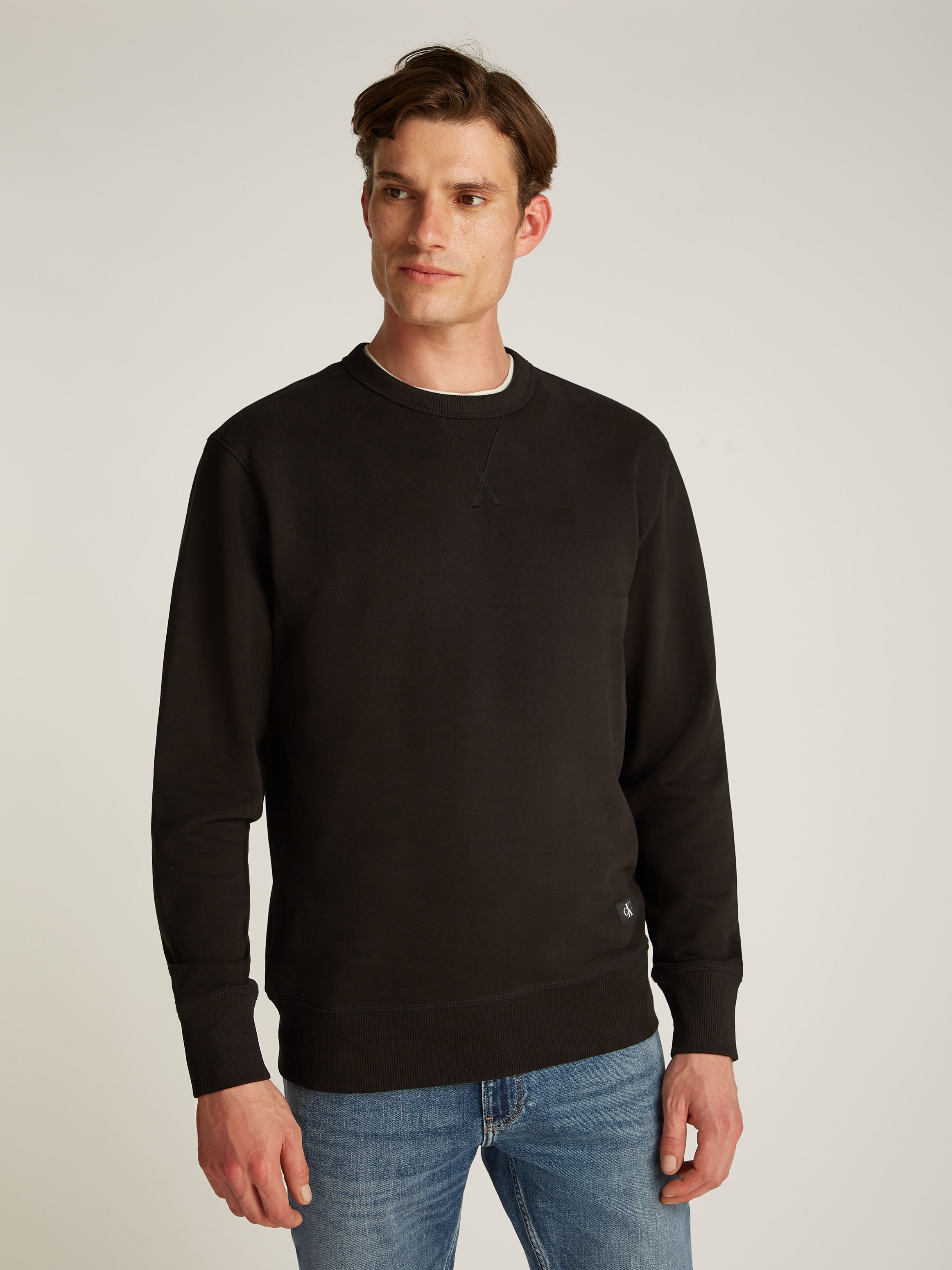 Calvin Klein Jeans Sweatshirt »WOVEN LABEL CREW NECK«, Logostickerei