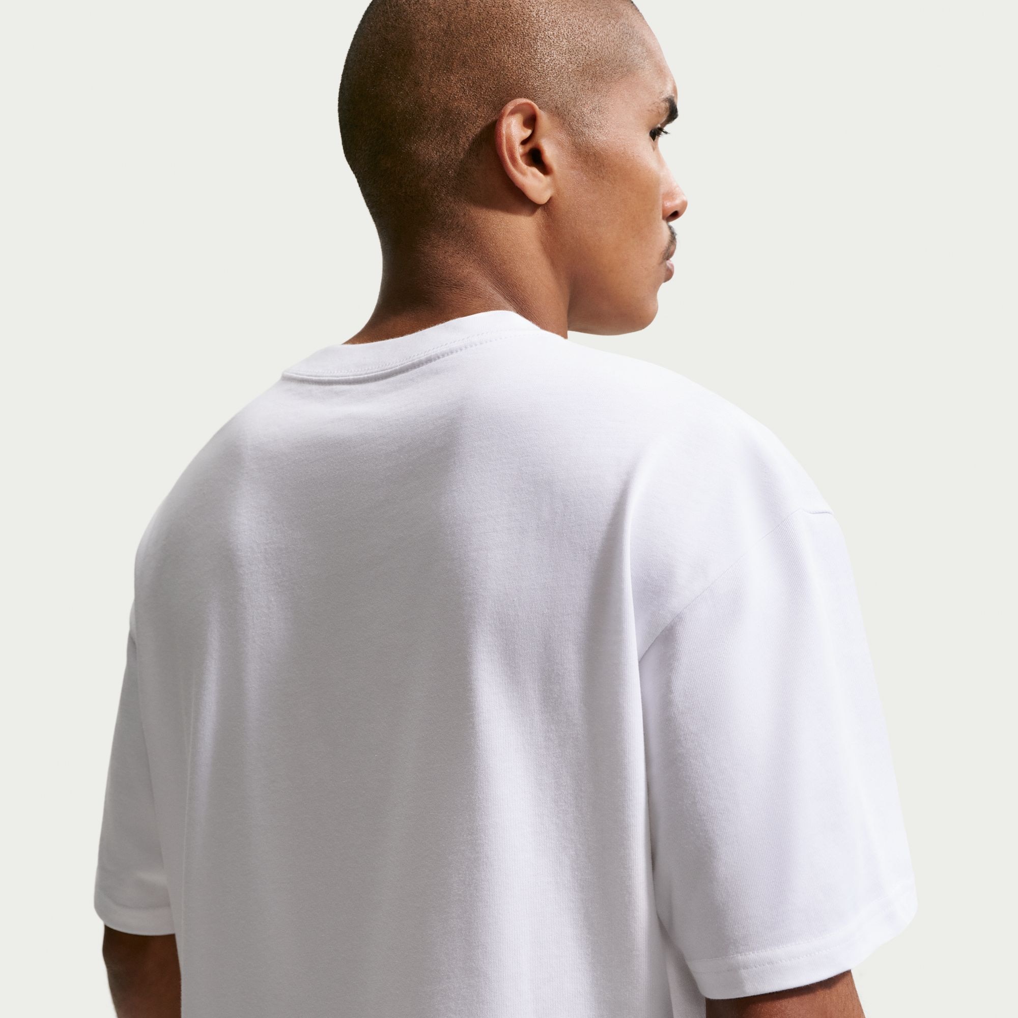 Nike Sportswear T-Shirt »M NSW TEE LSE BOXY FOOTBALL« aus Baumwolle, auch in großen Größen