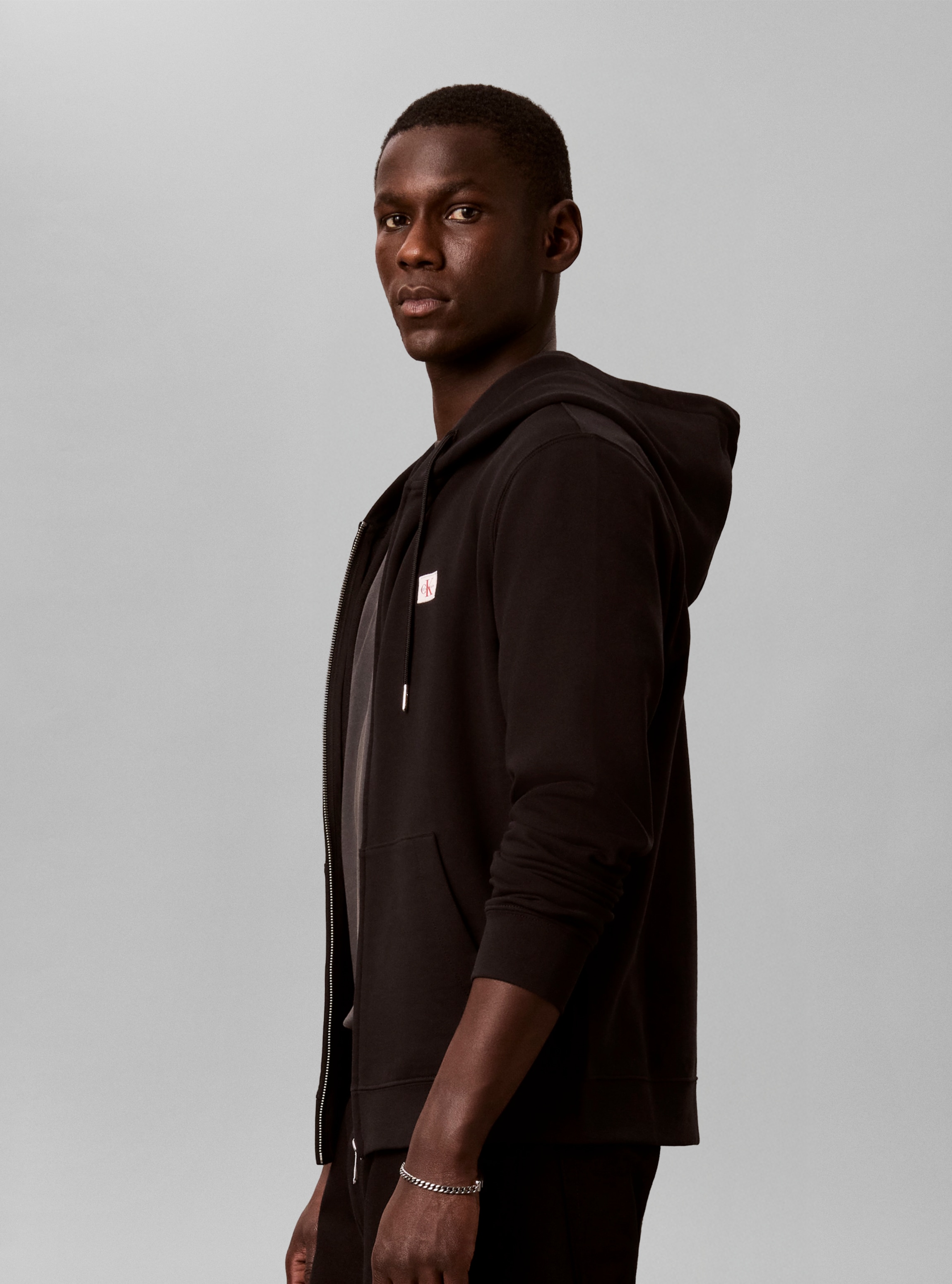 Calvin Klein Jeans Kapuzensweatshirt »WOVEN HOODIE«, Regular fit mit Kapuze
