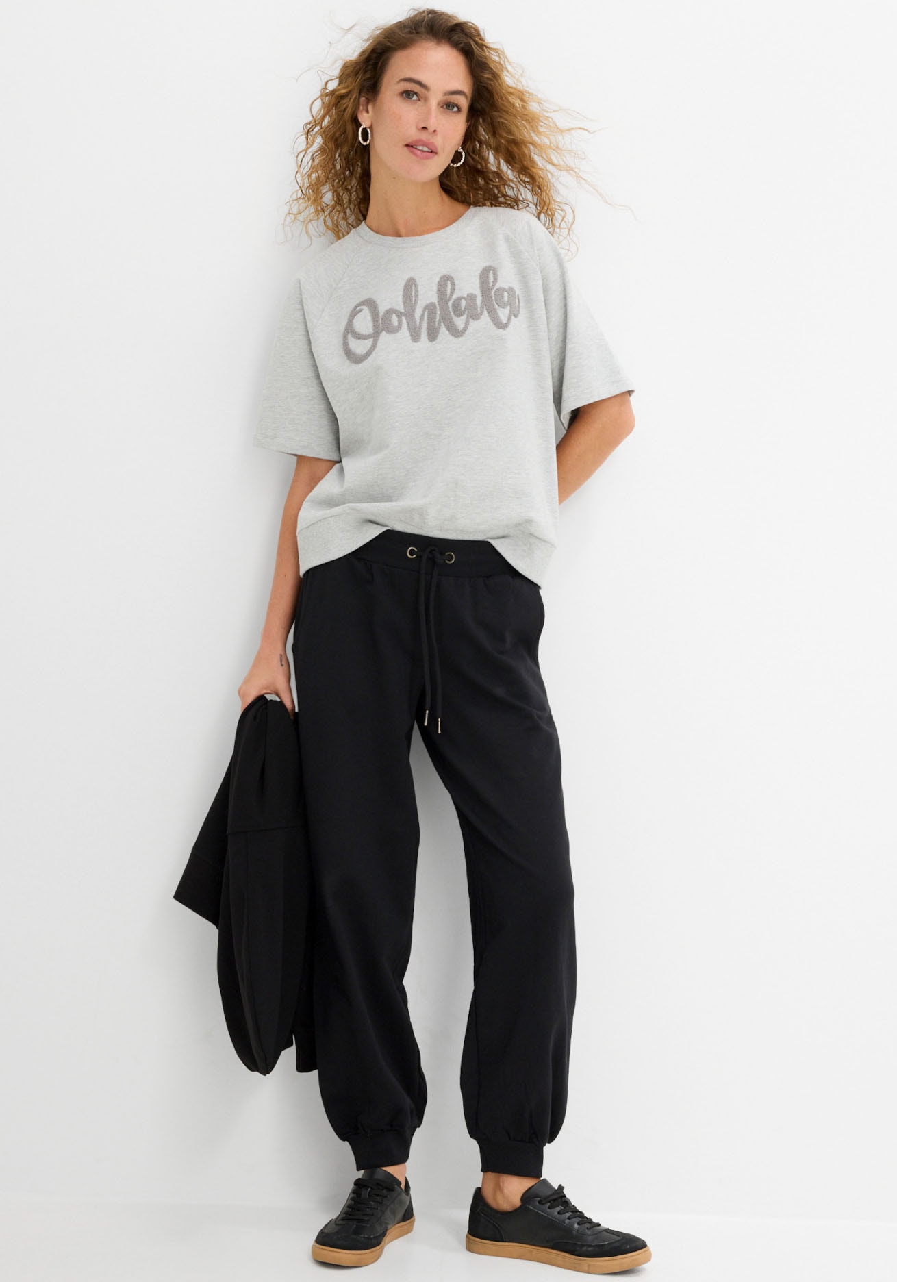 bonprix Jogginghose  aus Baumwolle und Polyester, lockere Passform, elastische Bündchen
