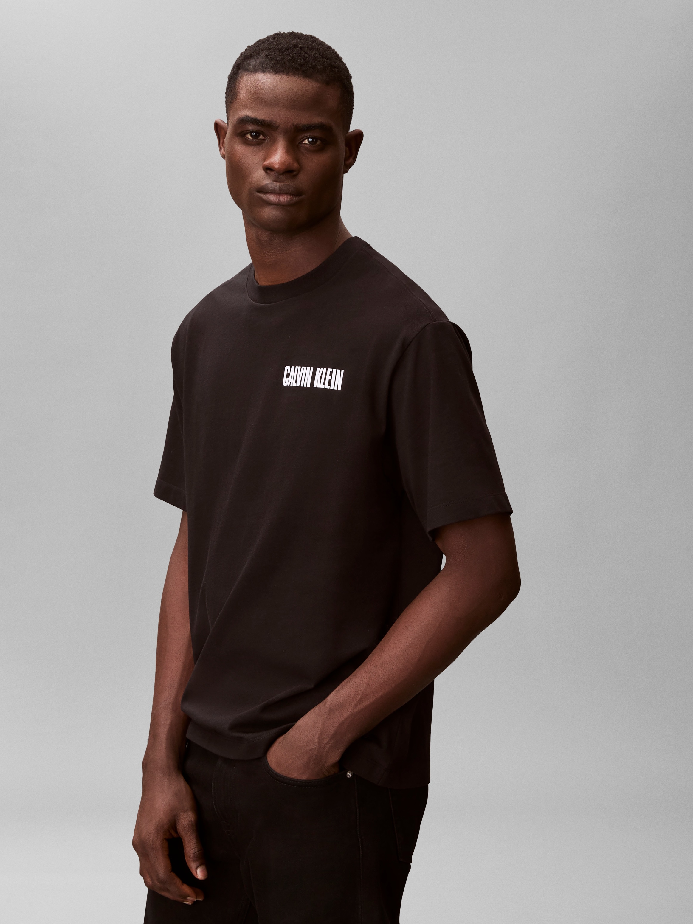 Calvin Klein Jeans T-Shirt »VERT LOGO GRAPHIC CREW« Regular fit mit Markenprint