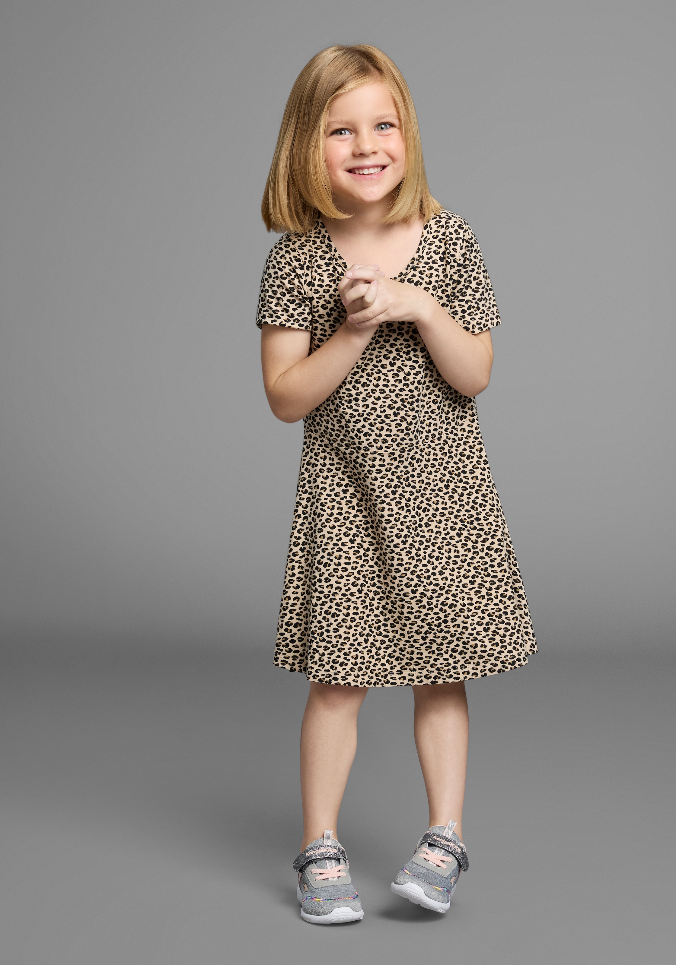 KIDSWORLD Jerseykleid »Shirtkleid in Leo-Musterung«, Shirtkleid in Leo-Optik, unten austestellt