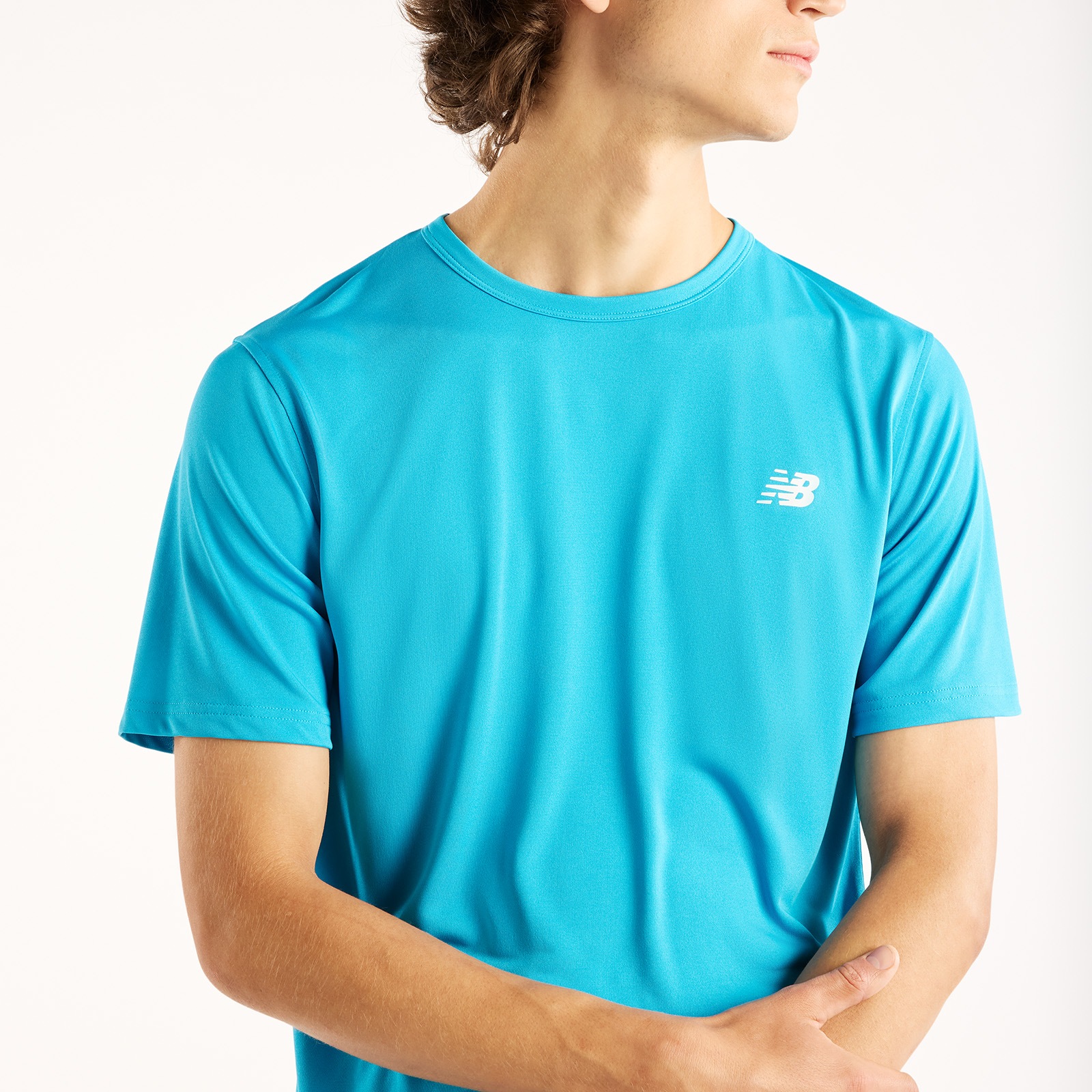New Balance Trainingsshirt »SPORT ESSENTIALS UTILITY T-SHIRT« atmungsaktiv, schnell trocknend, aus Polyester