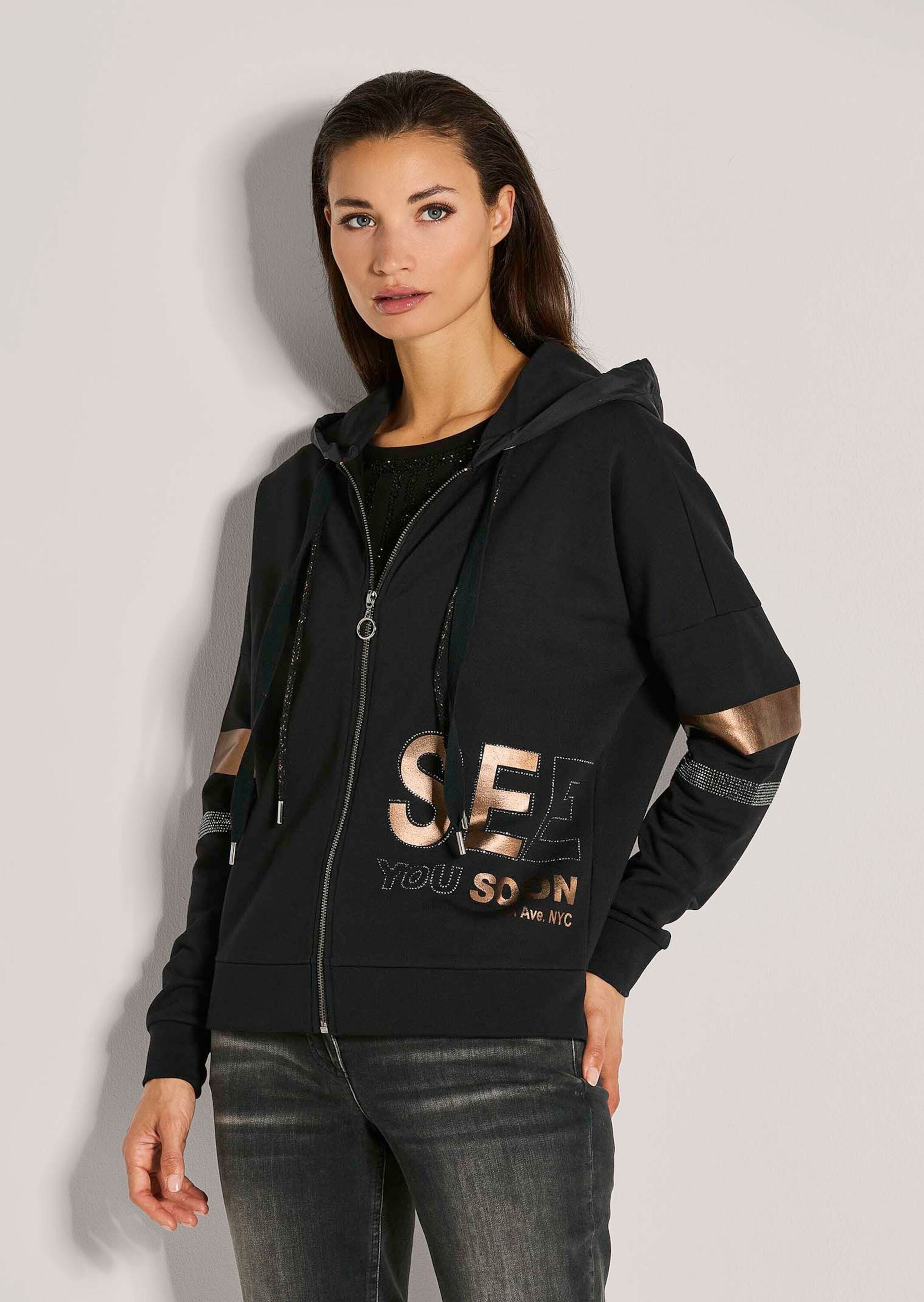 MADELEINE Kurzjacke »Kapuzenjacke Glänzende Oversized-Jacke mit Strass«