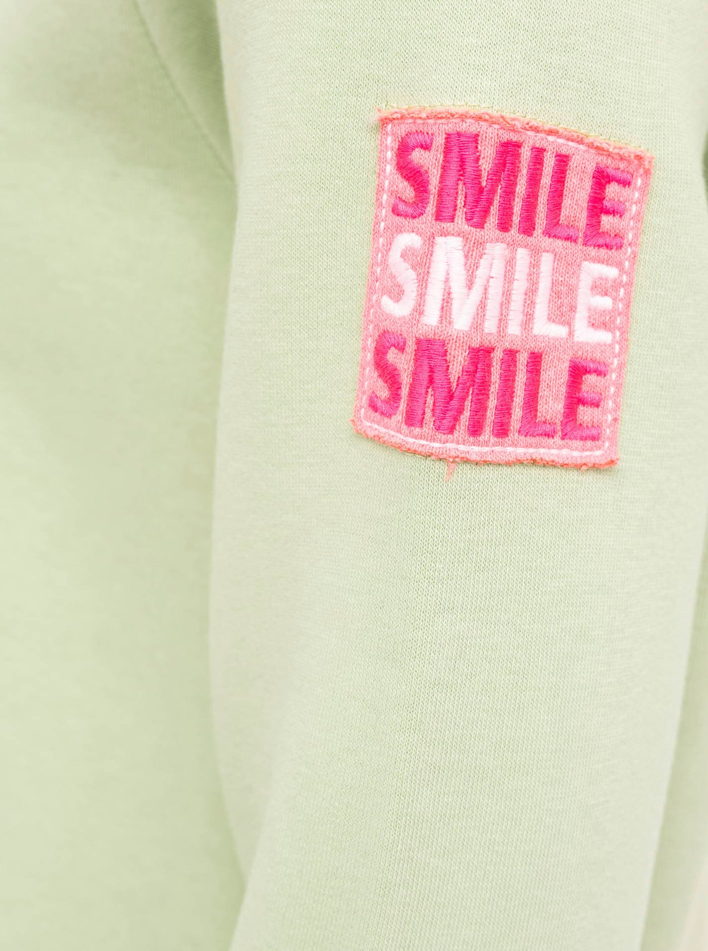 Zwillingsherz Jerseymantel »"Be Positive"«, mit großem Stickmotiv, Taschen und Reißverschluss