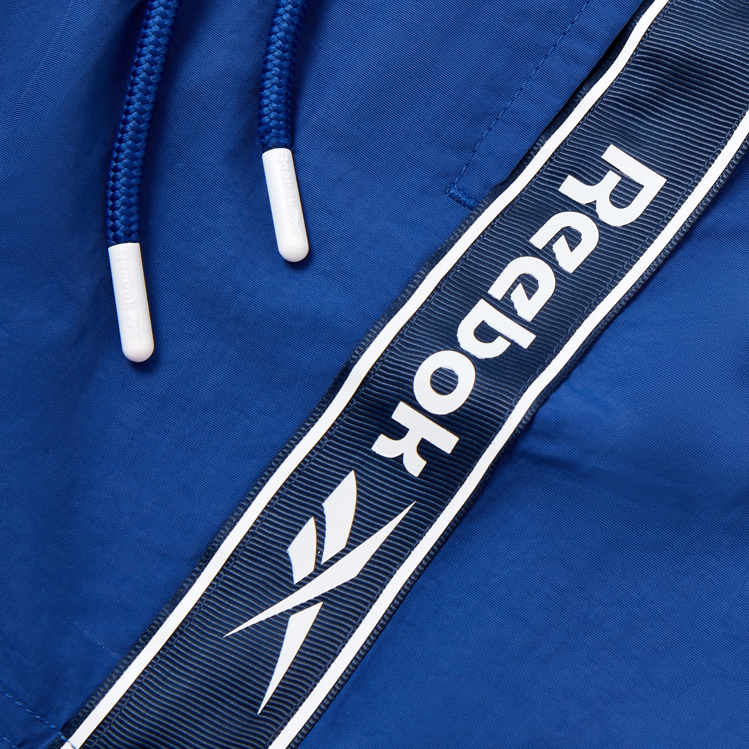 Reebok Badeshorts »Tanner« mit seitlichen Taschen und Logoschriftzug