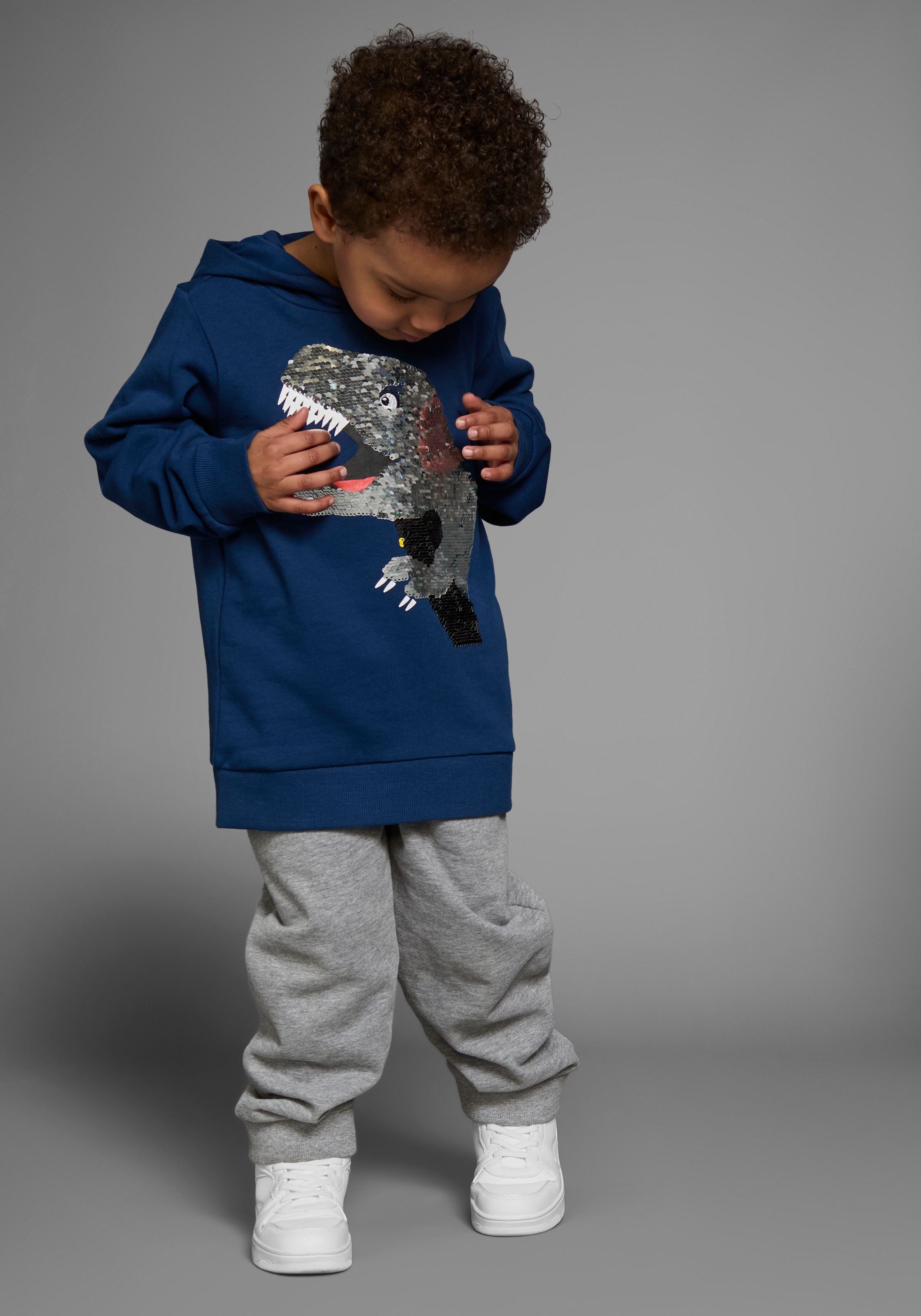 KIDSWORLD Kapuzensweatshirt »mit tollem Dino aus Wendepailletten«, Langarm, Basic-Passform, bedruckt, aus Baumwolle
