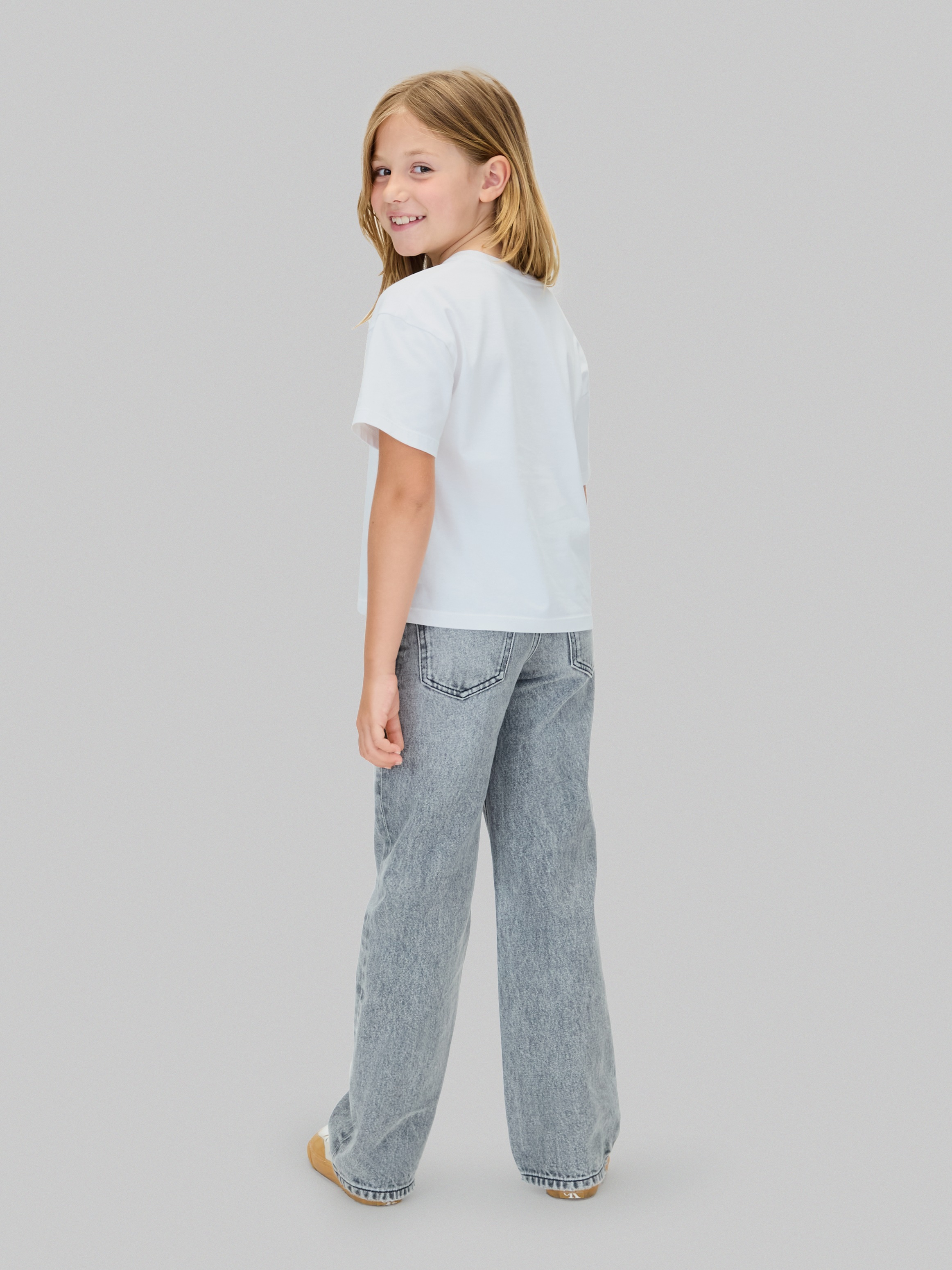 Calvin Klein Jeans T-Shirt »FESTIVE GRAPHIC SS T-SHIRT«, für Kinder bis 16 Jahre, Glitzer-Druck