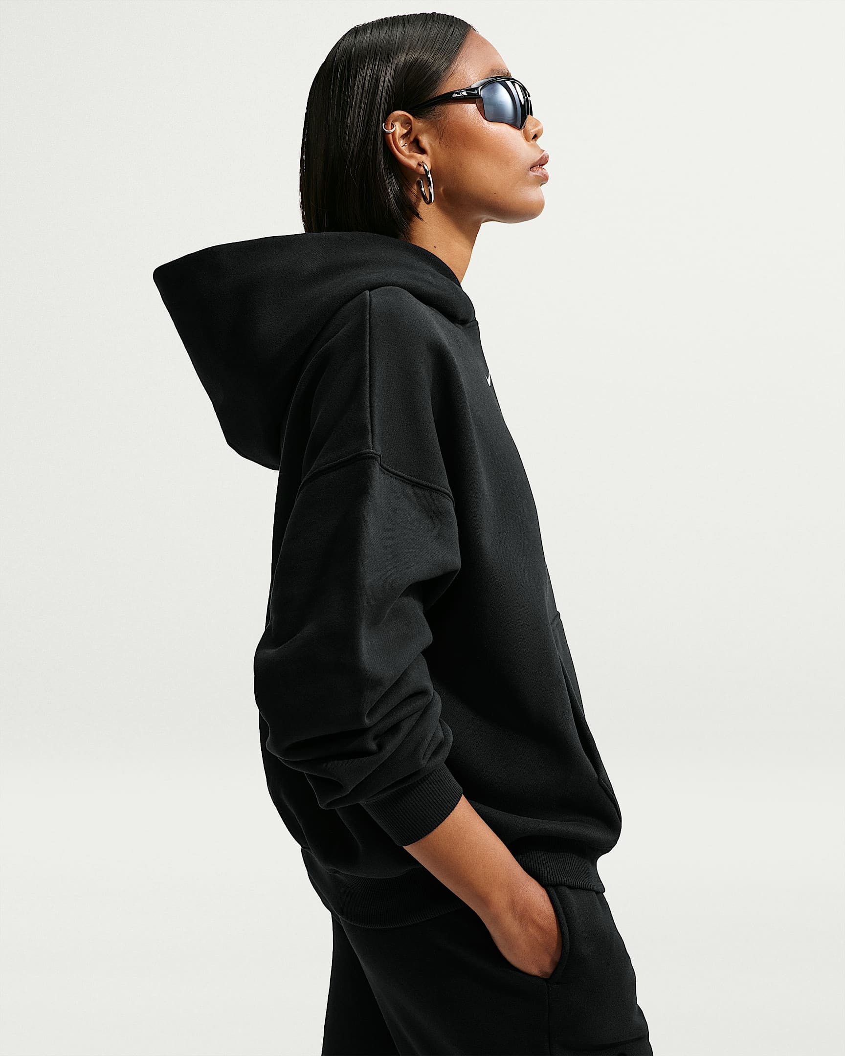 Nike Sportswear Kapuzensweatshirt »W NK STDO FLC MW OS PO HDY«, mit Kängurutasche, aus angerauter Sweatware, in normaler Länge
