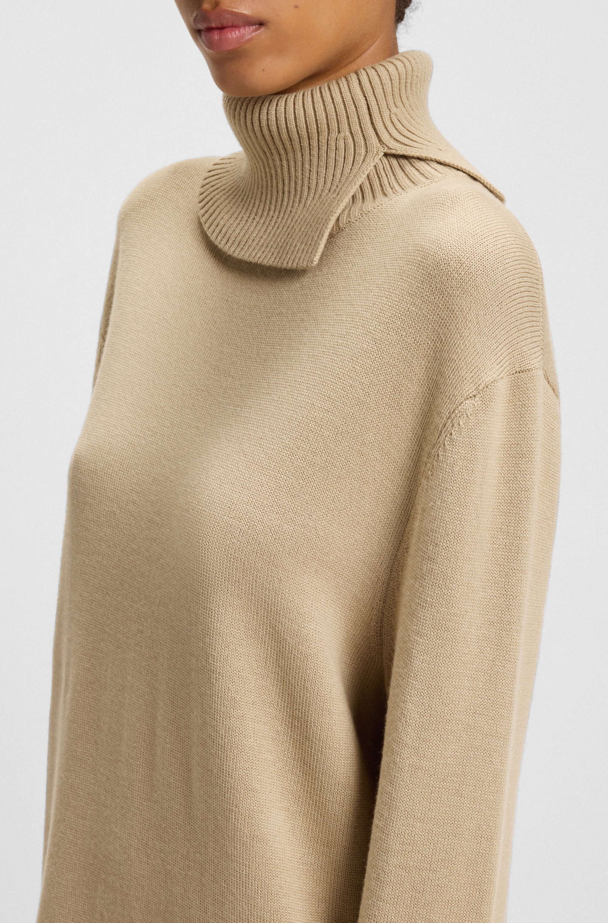 BOSS ORANGE Strickkleid »Feringatessa Premium Damenmode«, Relaxed Fit, mit Schlitzdetails, Turtle Neck