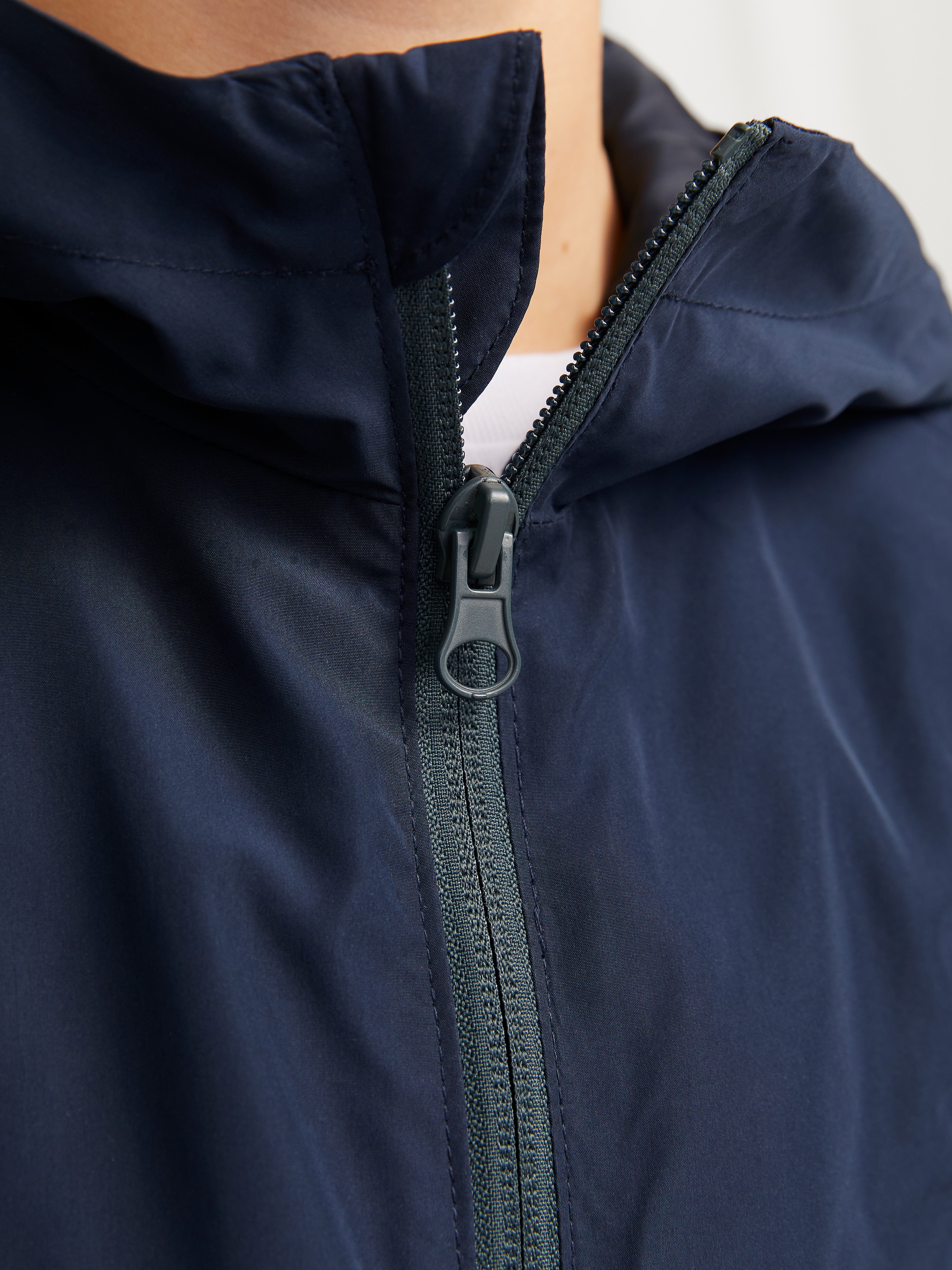 Jack & Jones Junior Windbreaker »JJWINDBREAKER PACKABLE ANORAK JNR«, mit Kapuze