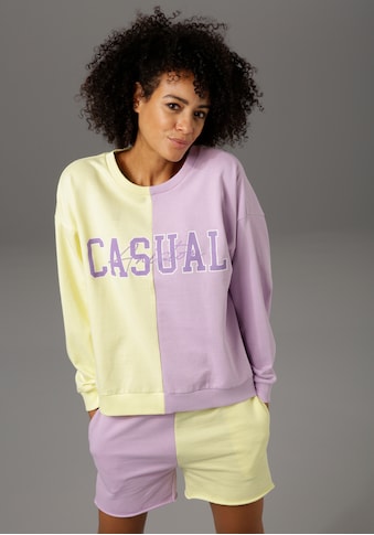 Aniston CASUAL Sweatshirt, mit topmodischem Flächenteiler und Aniston CASUAL-Schriftzug kaufen