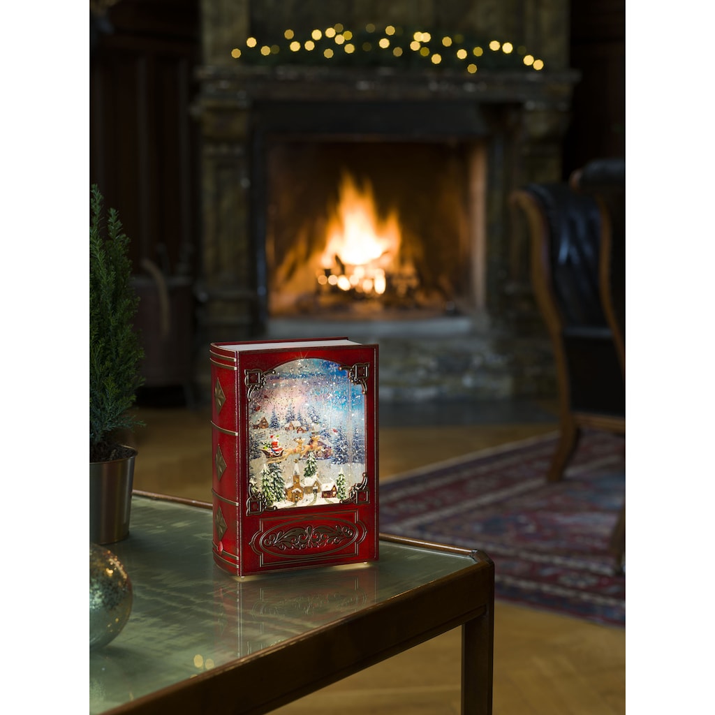 KONSTSMIDE LED Laterne, 1 flammig-flammig, Wasserlaterne, "Weihnachtsmann im Schlitten mit Rentieren über Dorf"