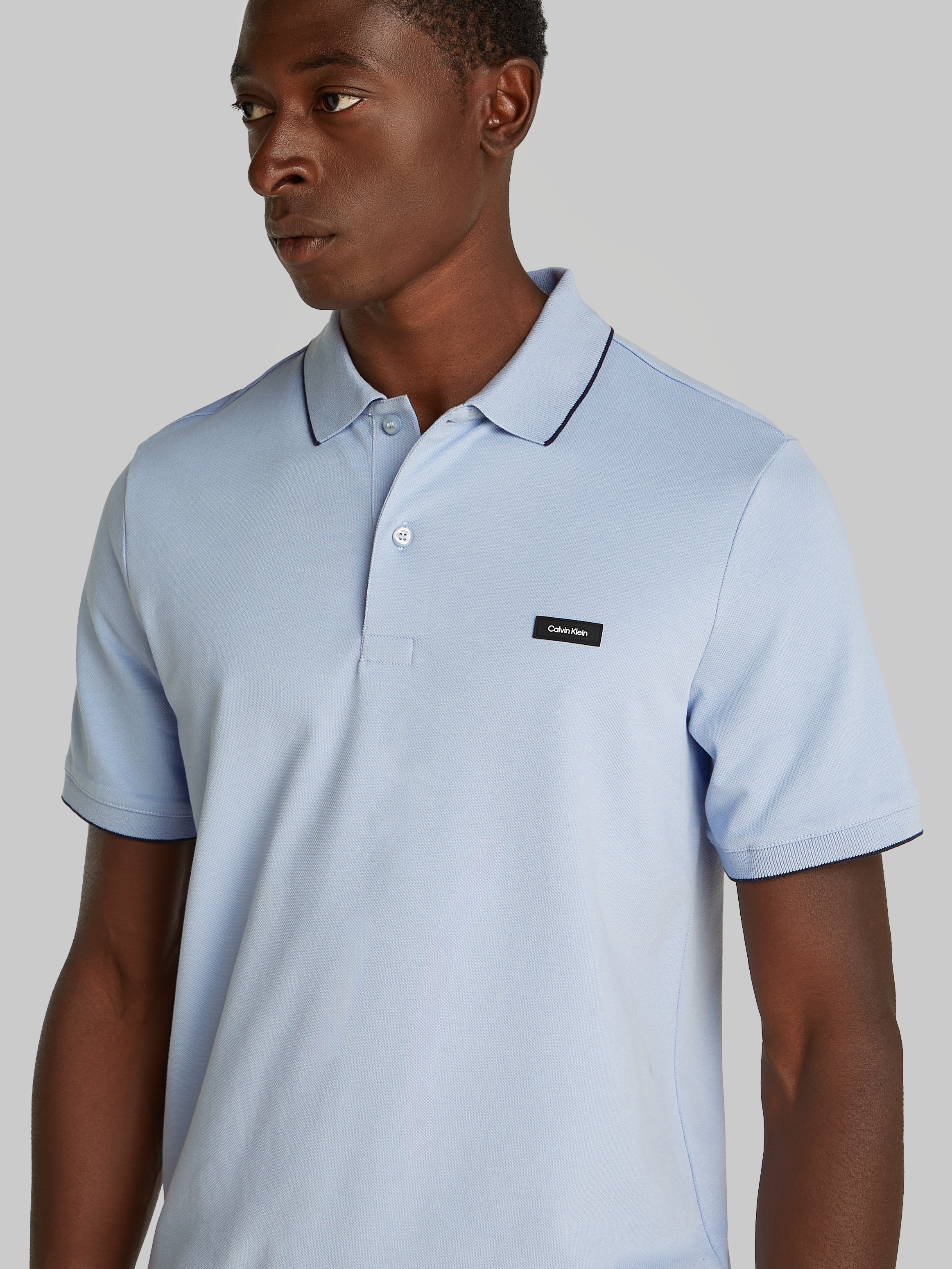 Calvin Klein Poloshirt »STRETCH PIQUE TIPPING POLO«, mit Streifendetail am Kragen