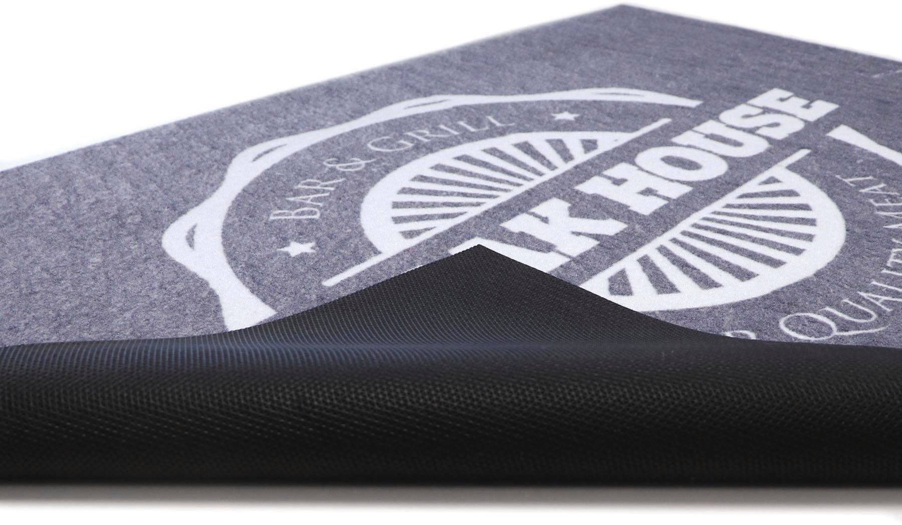 Primaflor-Ideen in Textil Fußmatte »BBQ Grillunterlage STEAK HOUSE, Made in Belgium«, rechteckig, 5 mm Höhe, Grillmatte ideal als Bodenschutz, mit Spruch, rutschhemmend, waschbar