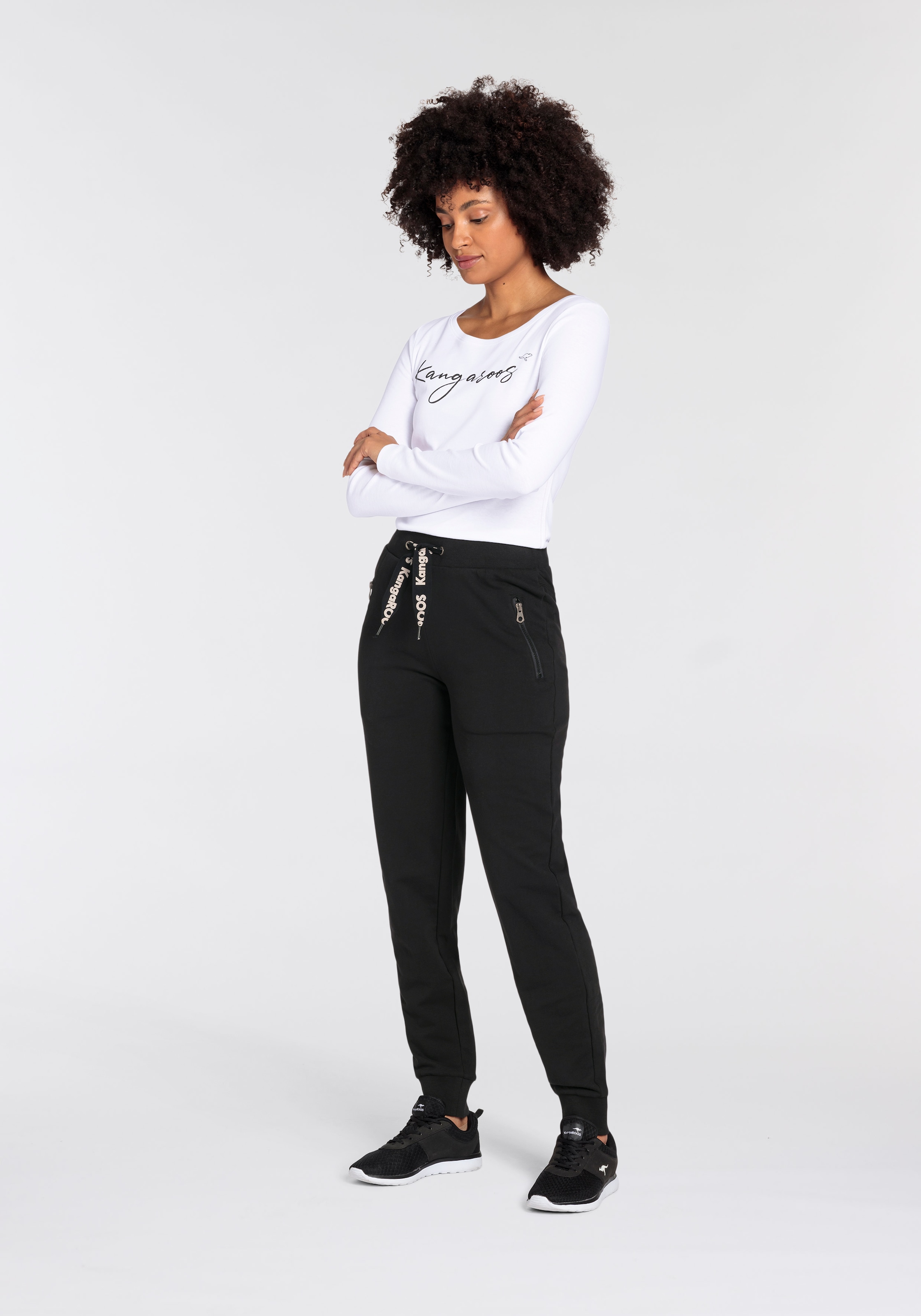 KangaROOS Jogginghose, mit Zippertaschen und Logo Band