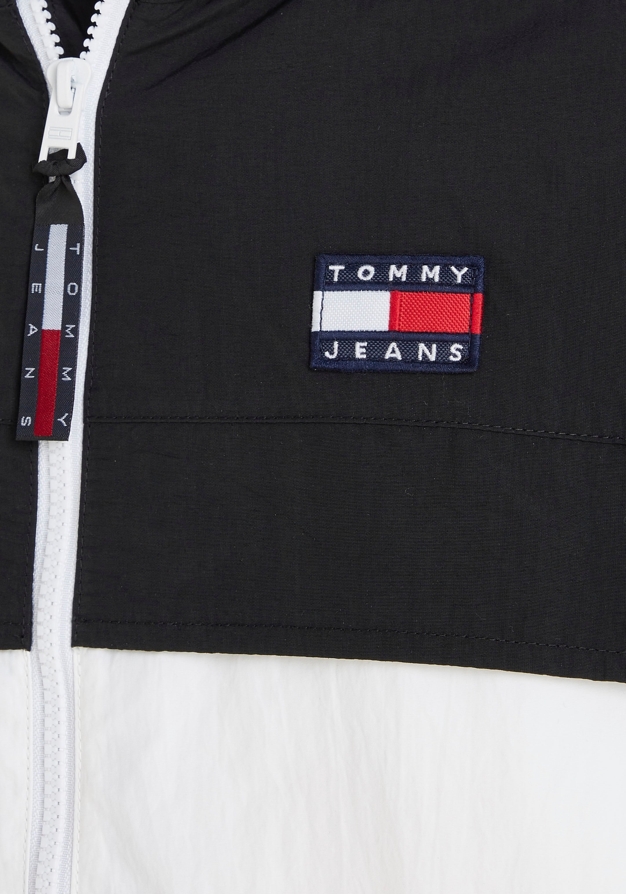 CLBK OTTO kaufen CHICAGO WINDBREAKER«, colorblocking Kapuze, »TJM online Jeans mit Design Windbreaker Tommy im bei