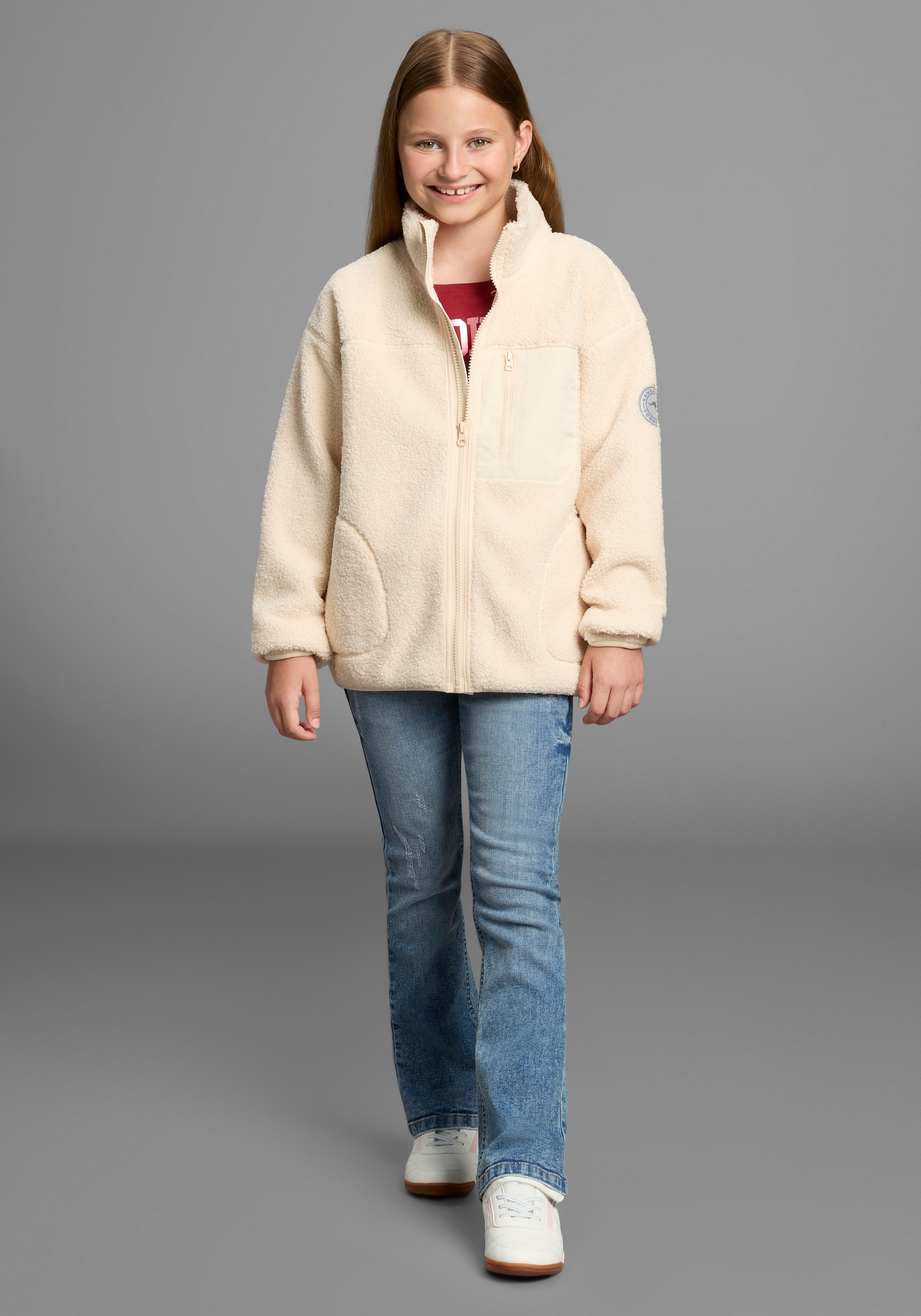 KangaROOS Sweatjacke »Kuschel-Jacke mit reflektierendem Badge«, Weicher Teddyplüsch