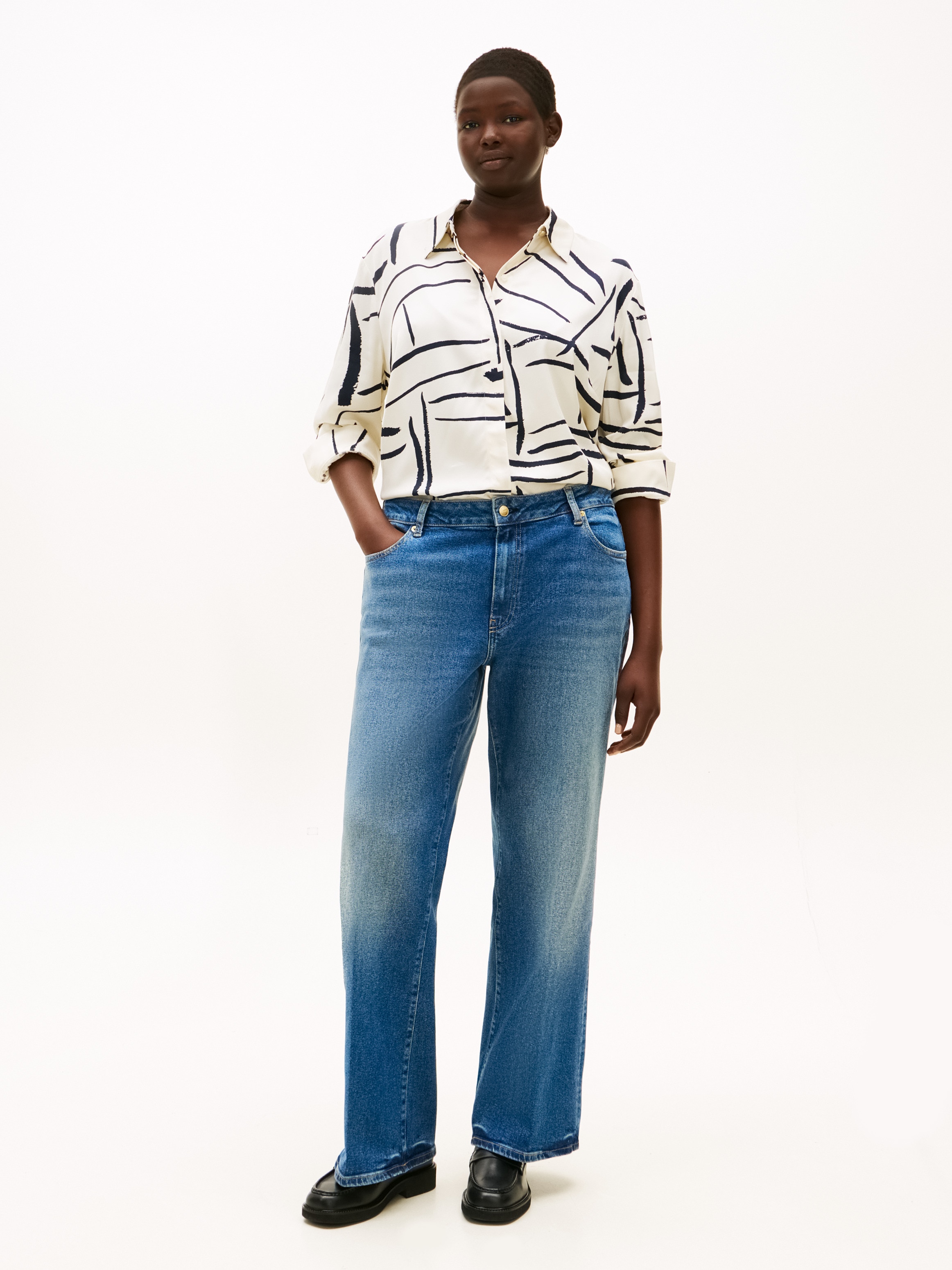 Tommy Hilfiger Curve Bootcut-Jeans »CRV DNM GLOW BOOTCUT RW« in großen Größen