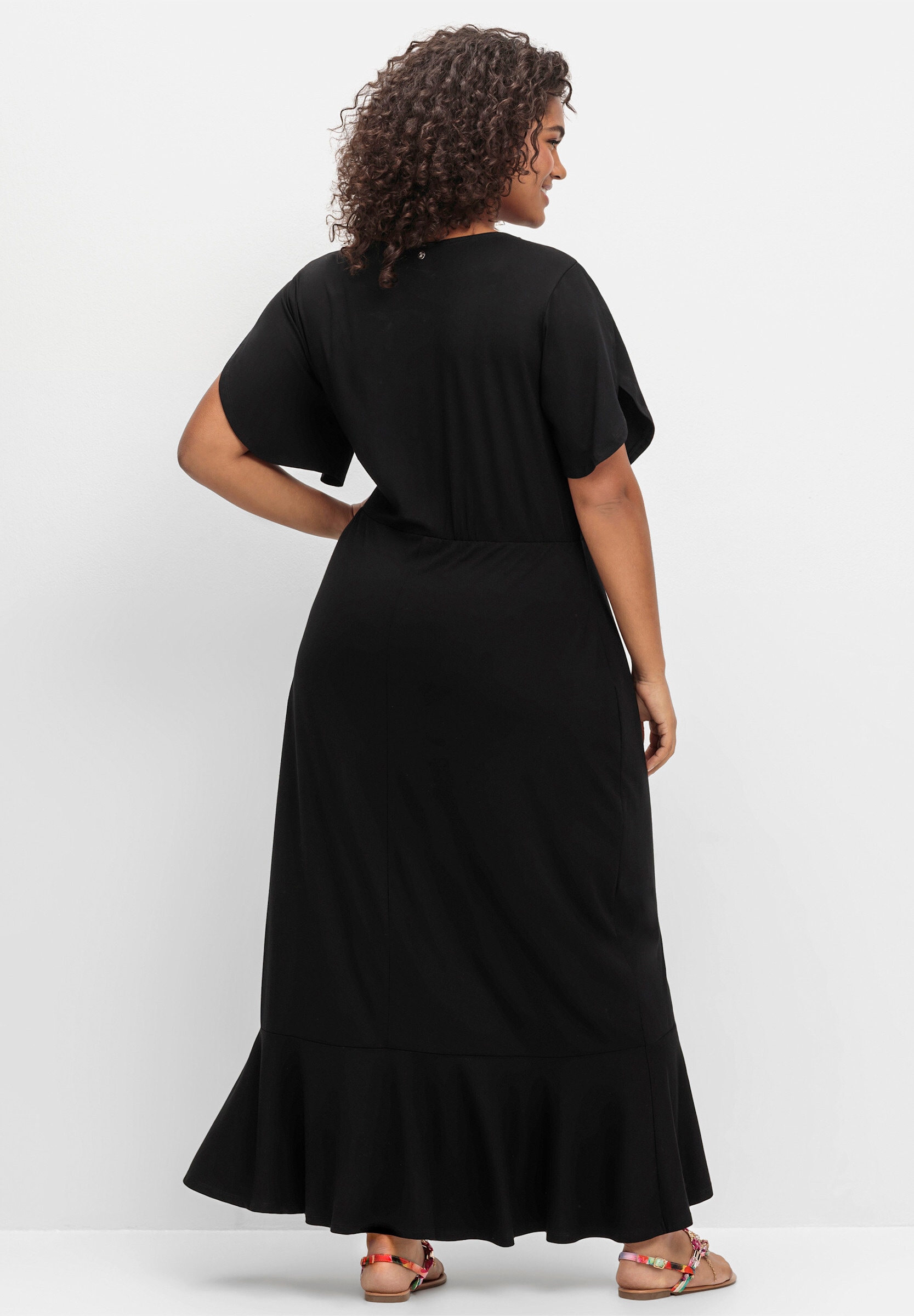 Sheego Strandkleid »Jerseykleid Jerseykleid in Wickeloptik, mit Volantrock« Ohne Tasche in Wickeloptik, mit Volantrock
