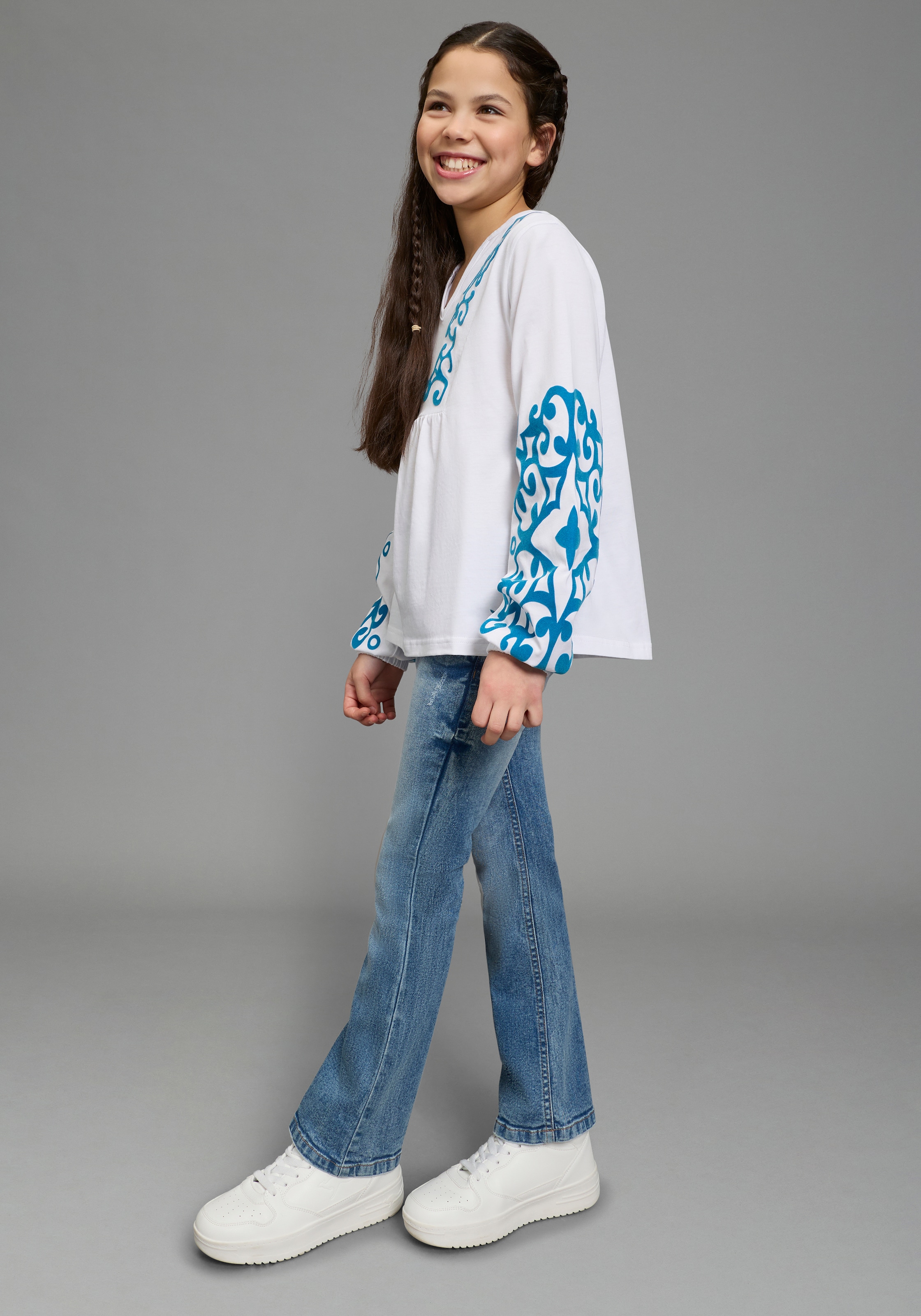 KangaROOS Langarmshirt »Kangaroos Tunika-Shirt mit aufwendigem Druck« mit V-Ausschnitt, Ärmel mit innenliegendem Gummizug, aus Baumwolle