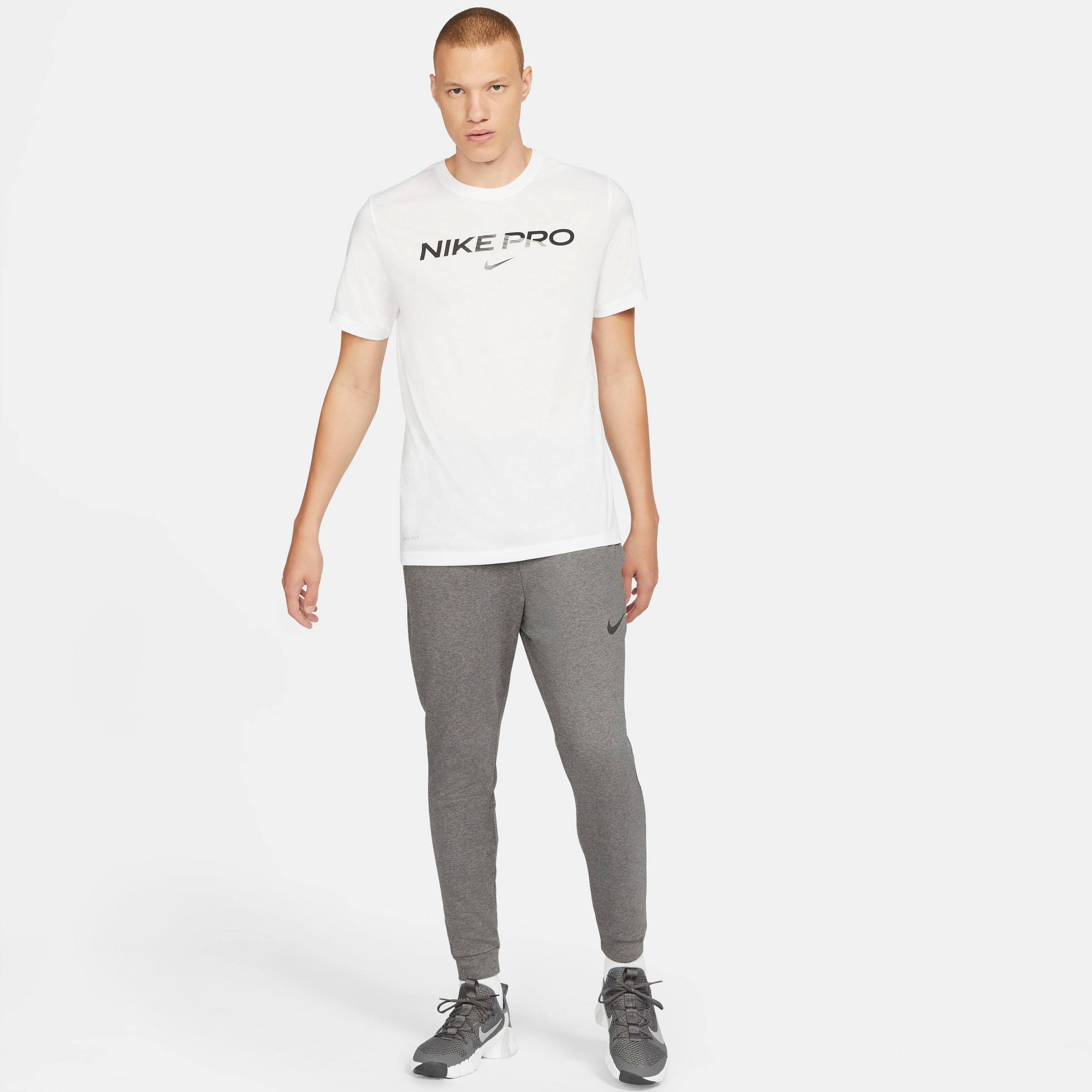 Nike Trainingshose »DRI-FIT MEN'S TAPERED TRAINING PANTS«