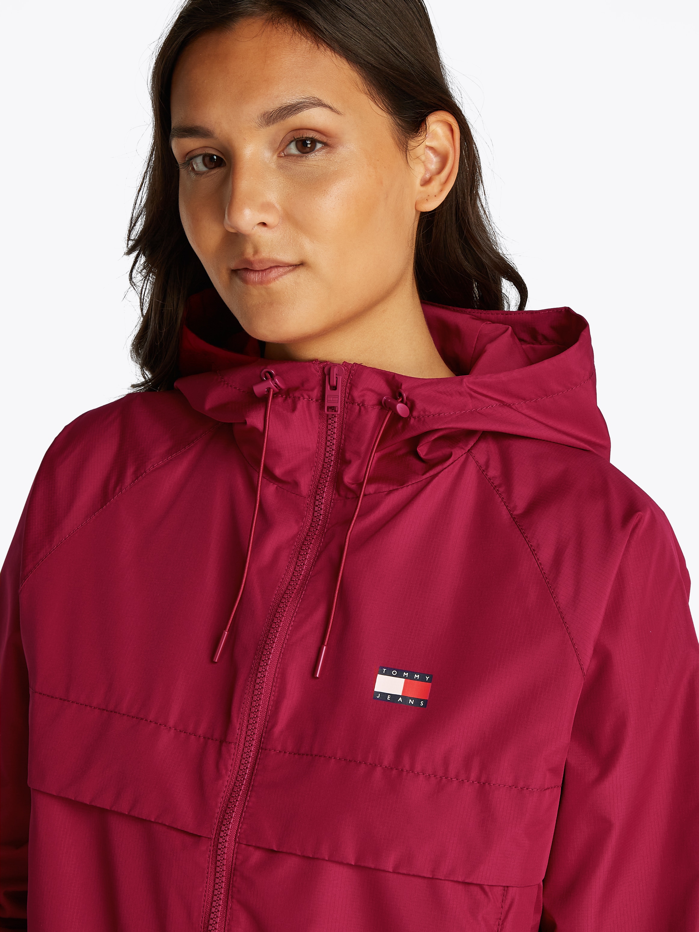 Tommy Jeans Windbreaker »TJW ESSENTIAL WINDBREAKER EXT«, mit Kapuze, mit Logodruck