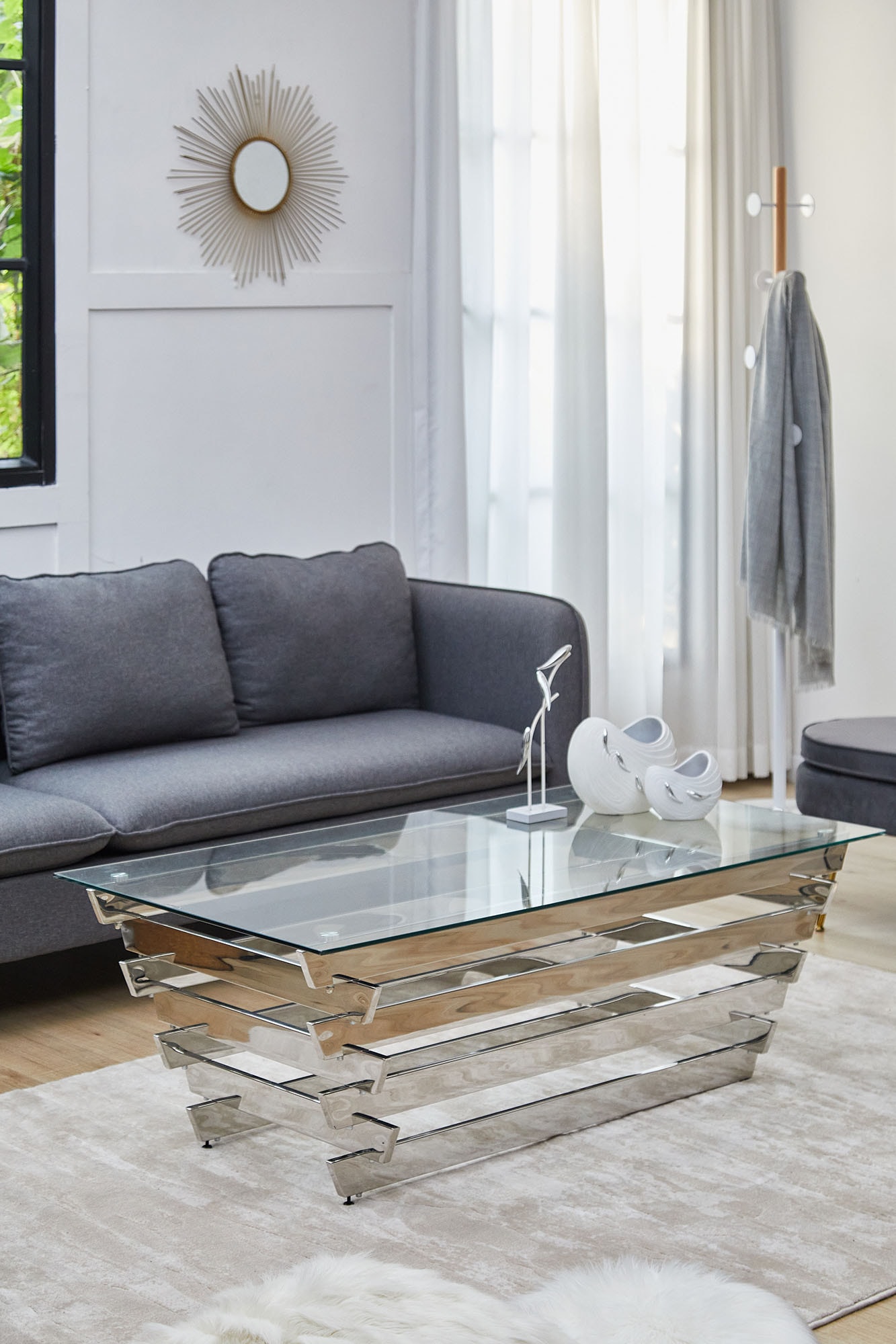 SalesFever Couchtisch, mit Design-Gestell aus Stainless Steel