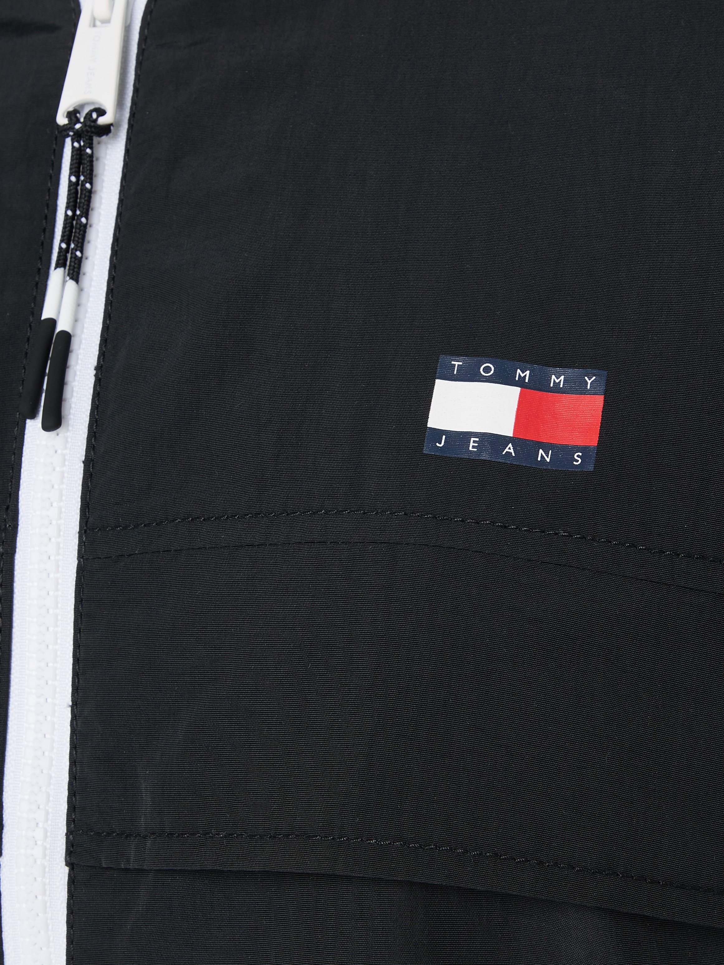 Tommy Jeans Windbreaker »TJW CHICAGO WINDBREAKER EXT«, mit Kapuze, mit kontrastfarbenen Reißverschlüssen