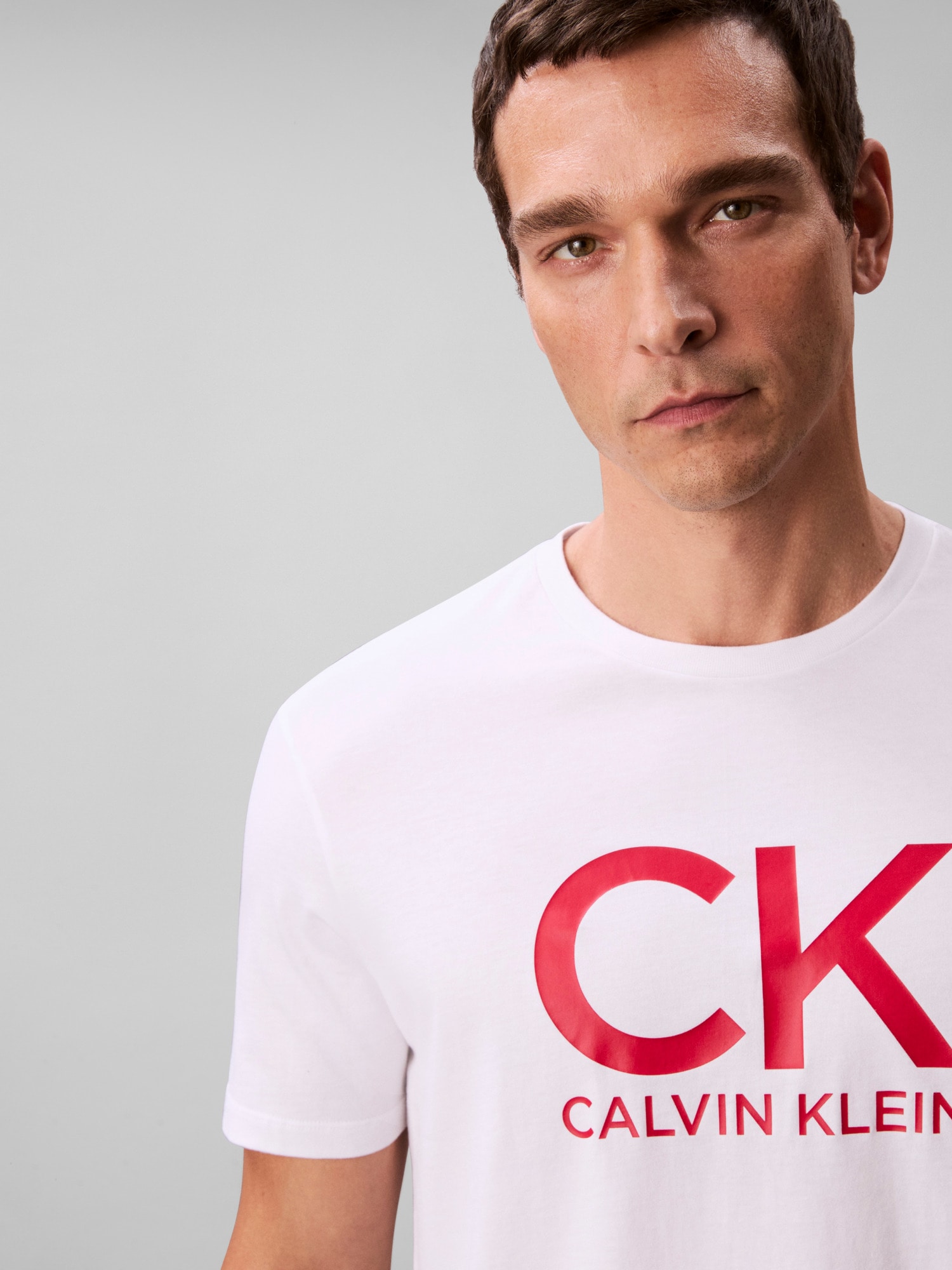 Calvin Klein Jeans T-Shirt »SS 30S EU CK CALVIN GRAPHIC TEE«, Mit Rundhalsausschnitt, regular fit