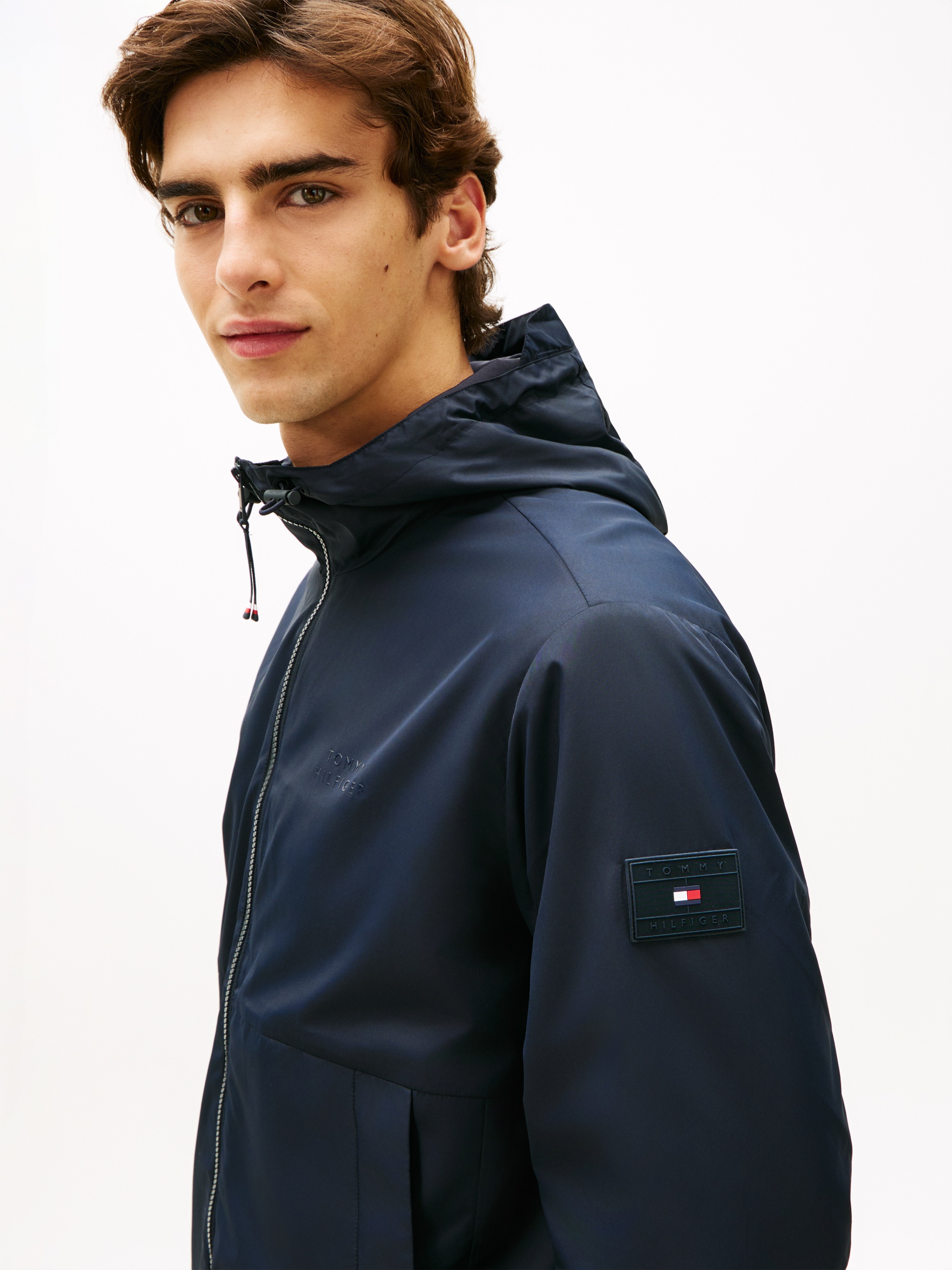 Tommy Hilfiger Allwetterjacke »BRANDED HOODED« mit Kapuze Windjacke Fahrradjacke Packable Regular fit mit Kapuze