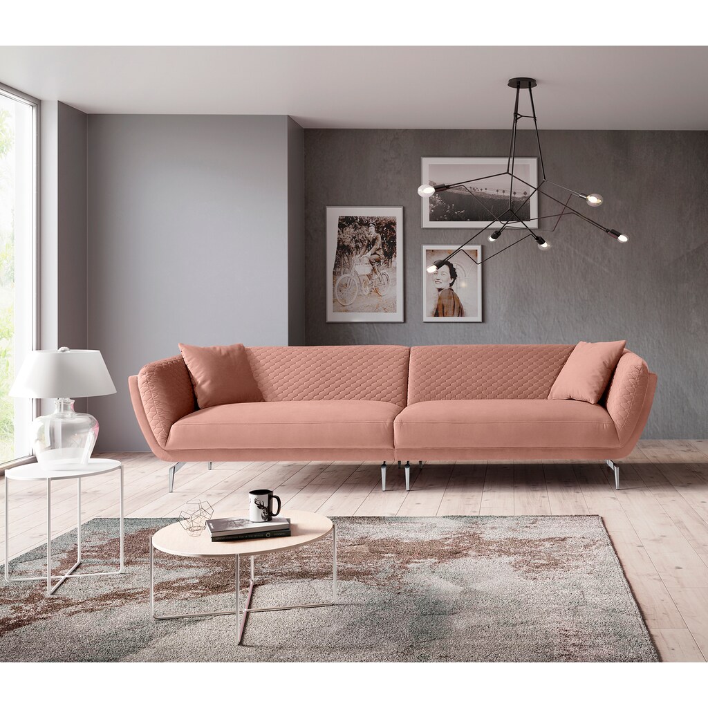 Leonique Big-Sofa »Izabella«, in elegantem Design, mit Steppung und extra hohen Füßen, inklusive dekorativen Wendekissen