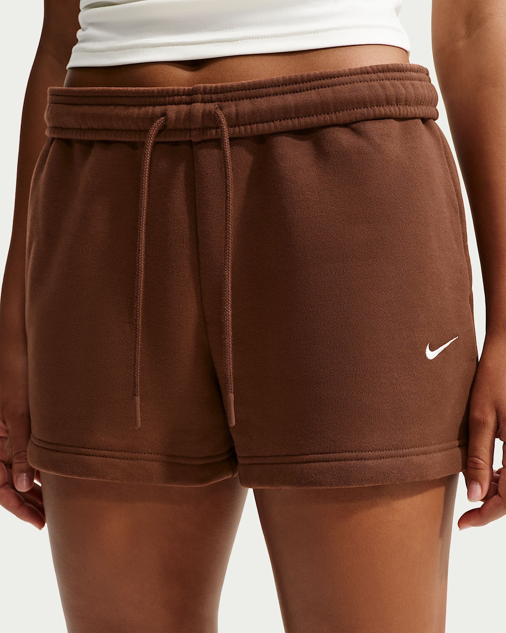 Nike Sportswear Shorts »W NK STDO FLC MW MR STD 4 SHRT«  mit Eingrifftaschen, ca. Mitte Oberschenkel lang, gerade Beinform