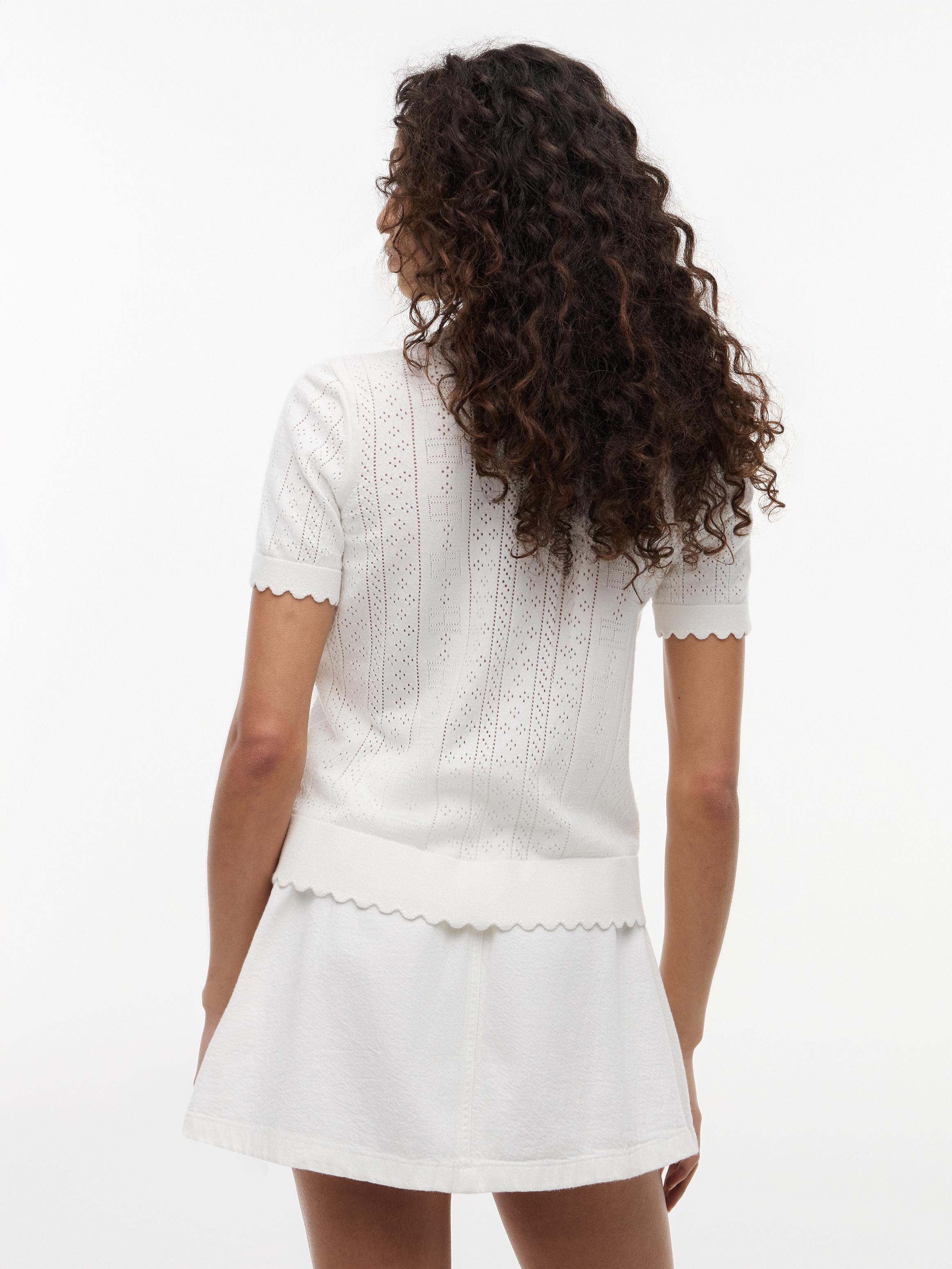 Tommy Jeans Kurzarmpullover »TJW POINTELLE POLO SWEATER« Viskosemischung, Pointelle Strickmuster, gewellte Säume