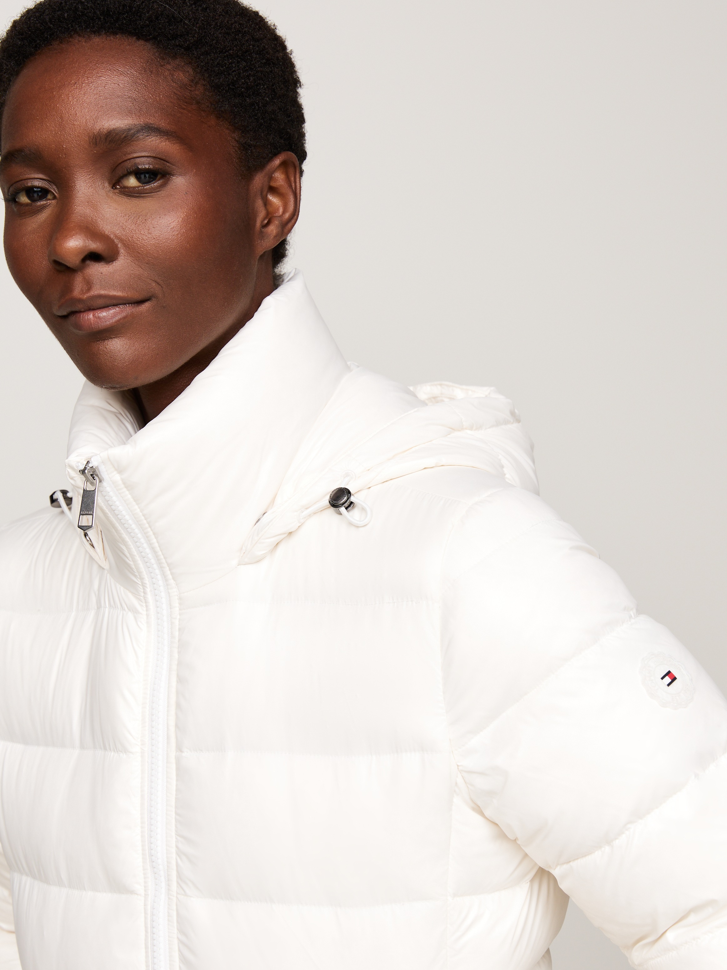 Tommy Hilfiger Steppjacke, mit Kapuze, mit Logoprägung