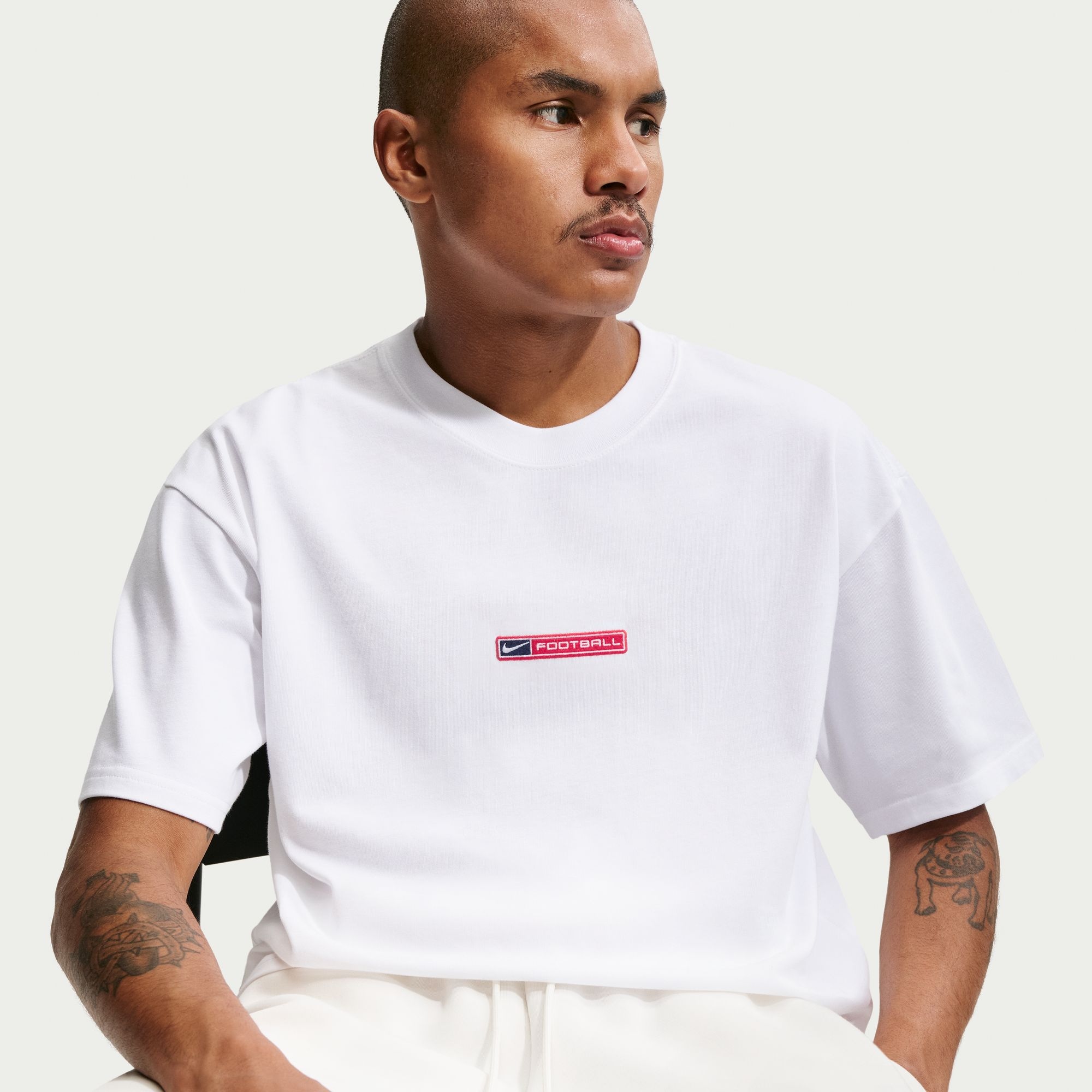 Nike Sportswear T-Shirt »M NSW TEE LSE BOXY FOOTBALL« aus Baumwolle, auch in großen Größen