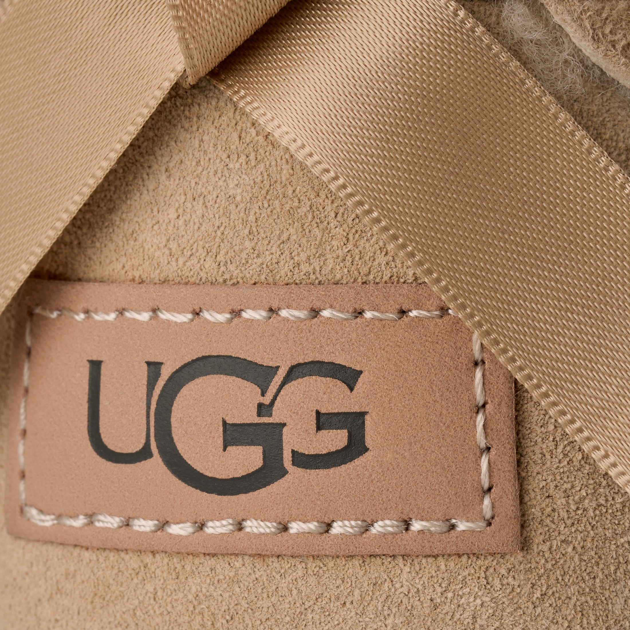 UGG Schlupfboots »W ULTRA MINI BAILEY BOW«  Winterboots mit Schleife und Logo-Aufnäher an der Ferse