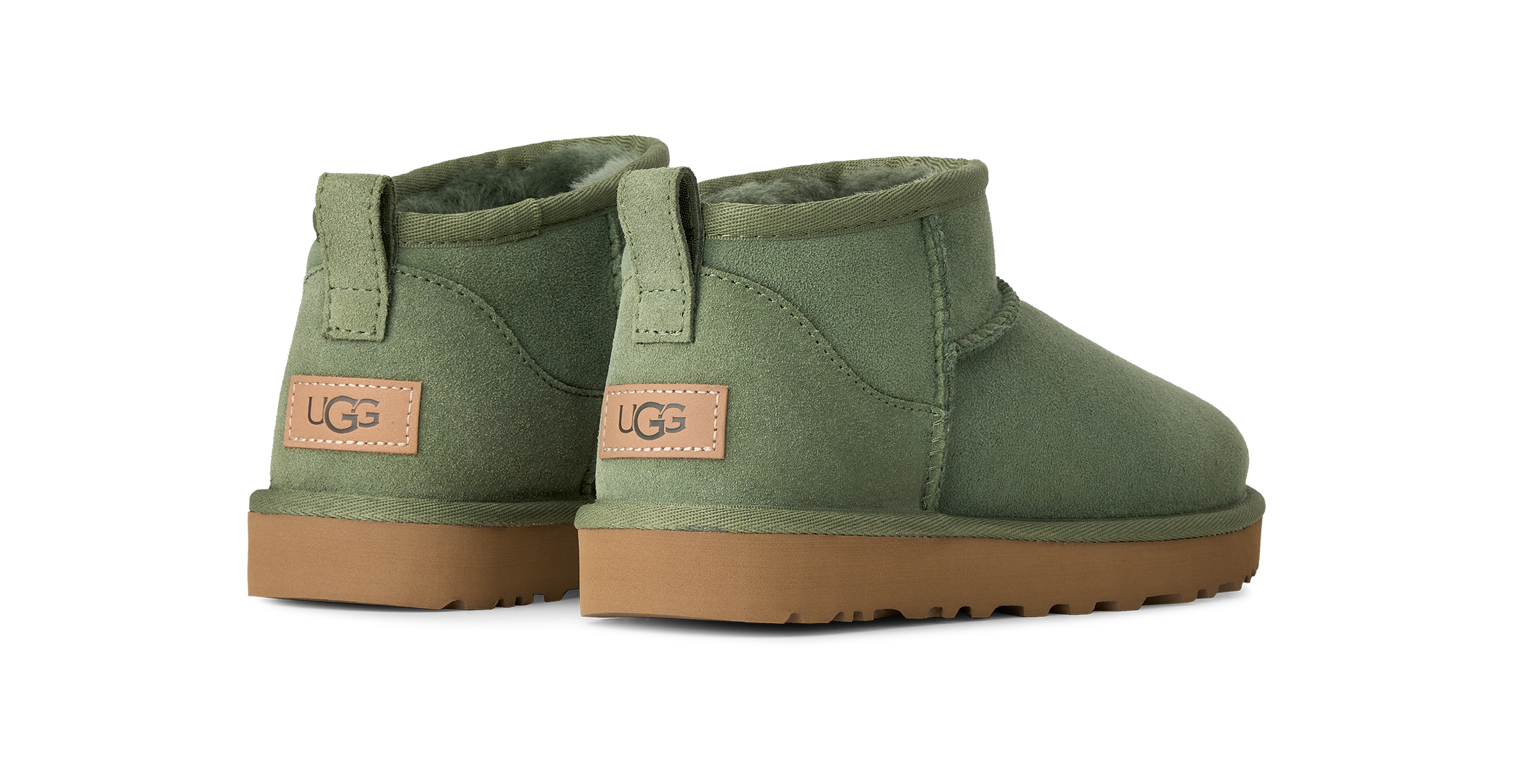 UGG Schlupfboots »Unisex, W CLASSIC ULTRA MINI«  Winterboots mit Ziernähten und Logoaufnäher an der Ferse