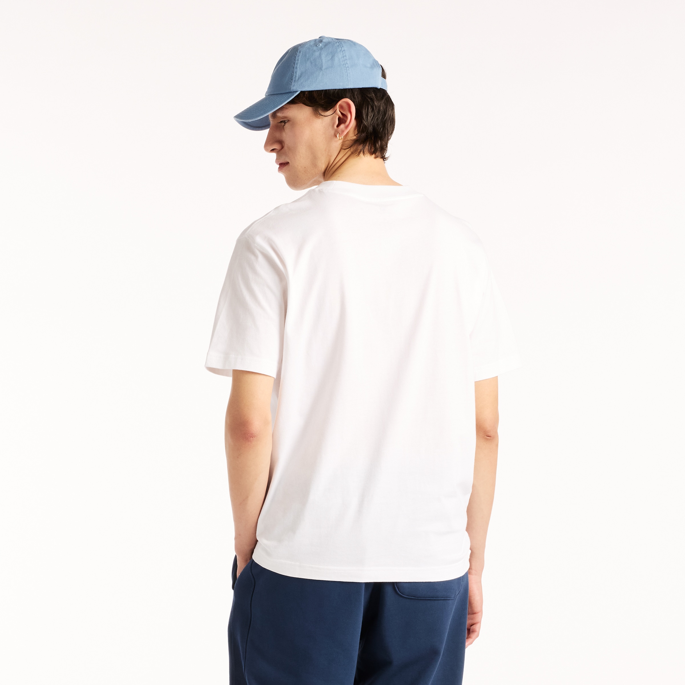 New Balance T-Shirt »REIMAGINED  GRAPHIC T-SHIRT« sportlicher Stil, aus Baumwolle, T-Shirt-Schnitt